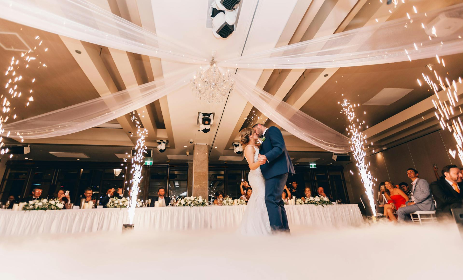 A bridal couple dancing at wedding reception | Source: Pexels