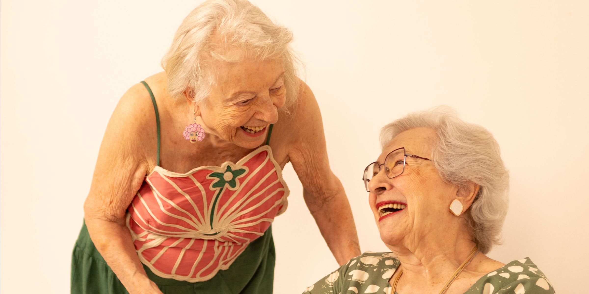Two elderly women laughing | Source: Pexels