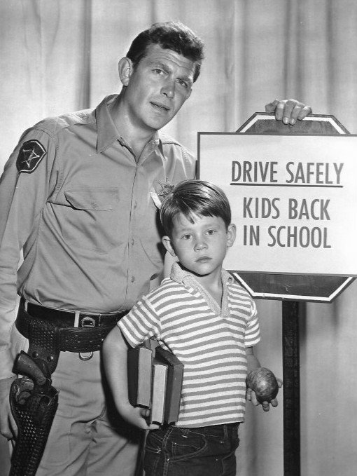Andy Griffith and Ron Howard in a publicity photo for The Andy Griffith Show, 1961 | Photo: Wikimedia Commons Images