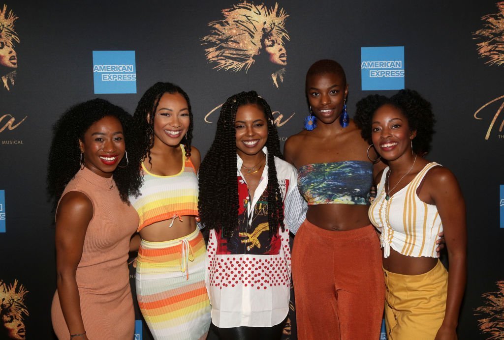 Destinee Rea, Holly Conway, Adrienne Warren, Mars Rucker and Kayla Davion pose at a photo call for the new broadway musical "Tina - The Tina Turner Musical" at The New 42nd Street Studios | Photo: Getty Images Destinee Rea, Holly Conway, Adrienne Warren, Mars Rucker and Kayla Davion pose at a photo call for the new broadway musical "Tina - The Tina Turner Musical" at The New 42nd Street Studios | Photo: Getty Images