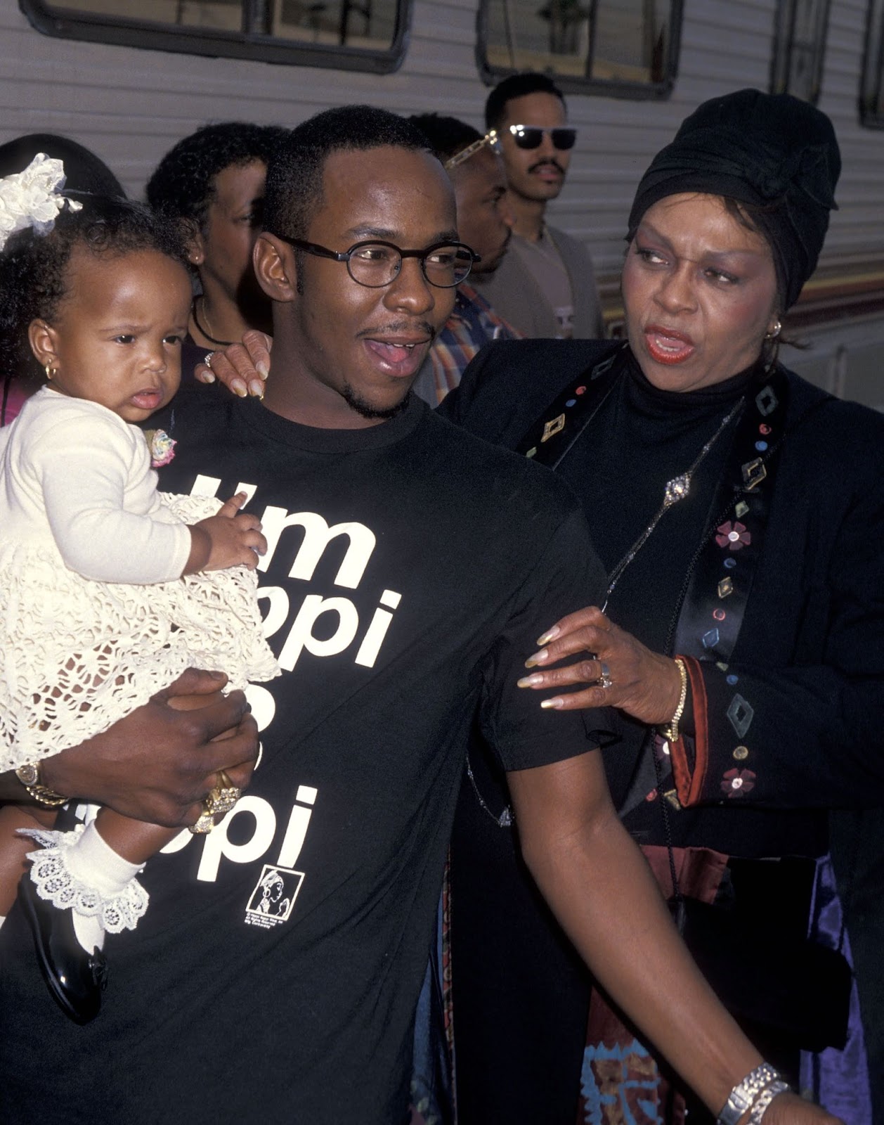 Bobby Brown holding his daughter Bobbi Kristina Brown with Cissy Houston at the Eighth Annual Soul Train Music Awards on March 15, 1994, in Los Angeles, California. | Source: Getty Images