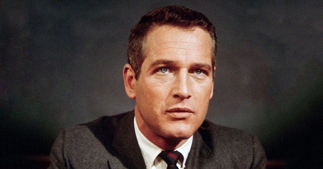 Paul Newman pictured in a studio wearing a jacket and a tie in 1965. | Photo: Getty Images