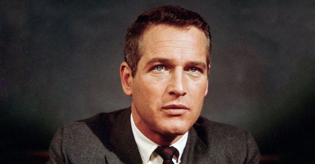 Paul Newman fotografiado en un estudio con chaqueta y corbata en 1965. | Foto: Getty Images