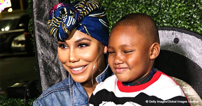 Tamar Braxton says son Logan sleeps in bed with her & new man and it's none of Vince's business