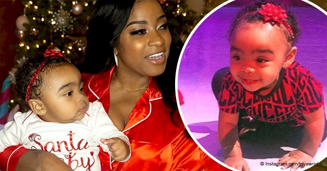 Toya Wright's daughter is a little fashionista in red Gucci dress & matching ribbon in new pics