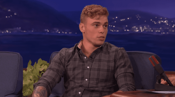 Gus Kenworthy talking about coming out on "Conan" in January 2016 | Photo: YouTube/Team Coco