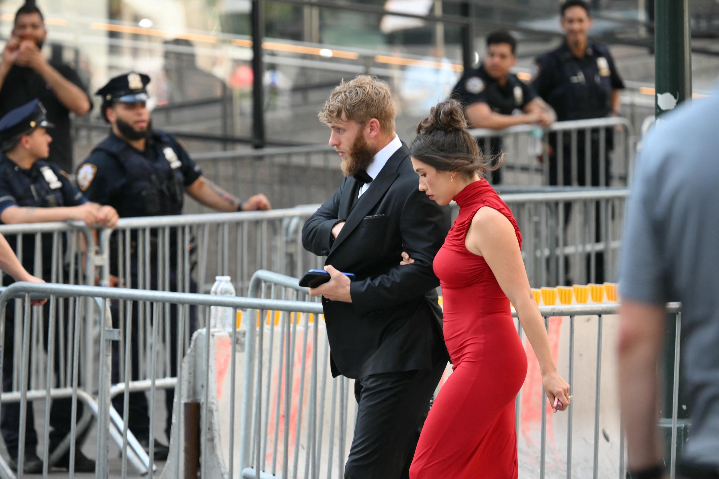 Cooper Kupp and his wife, Anna Marie Kupp, arrive at Madison Square Garden for Taylor Swift and Travis Kelce’s wedding celebration. The couple were among the guests who gathered for the star-studded New York City event. | Source: Getty Images