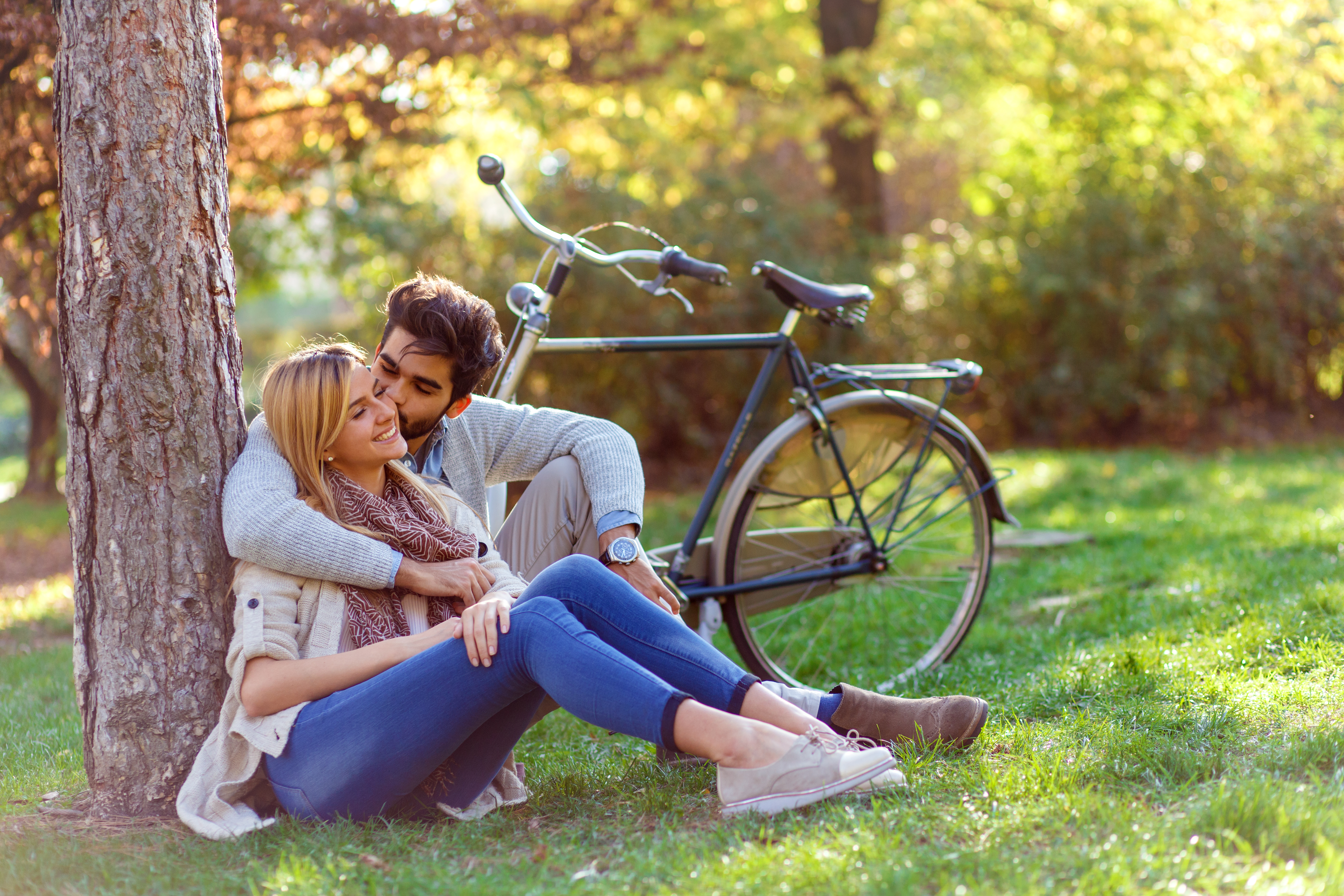 A husband kissing his wife | Source: Shutterstock