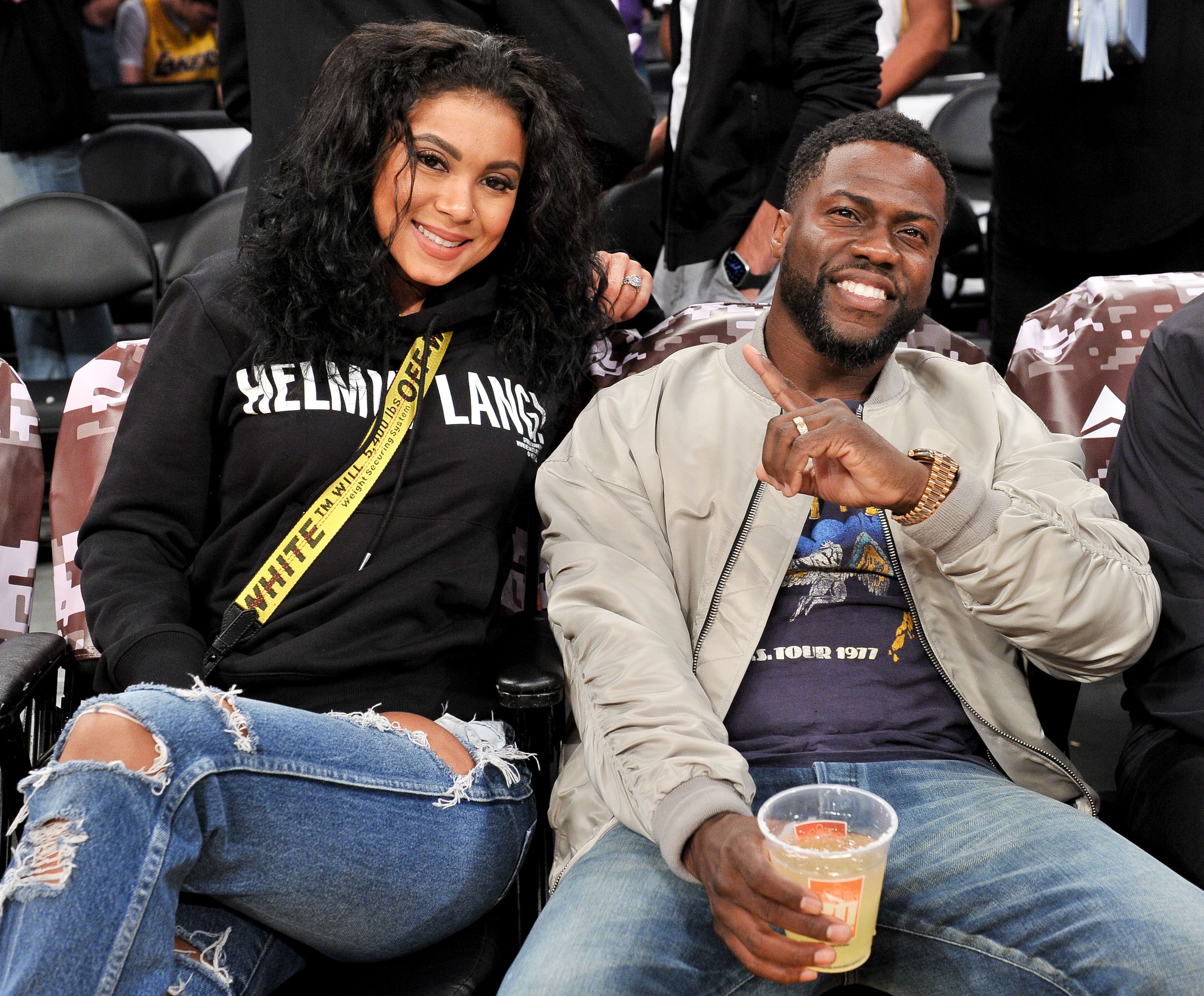 Kevin Hart and Eniko Parrish at a Los Angeles Lakers and the Atlanta Hawks basketball game on November 17, 2019, in Los Angeles, California | Photo: Allen Berezovsky/Getty Images