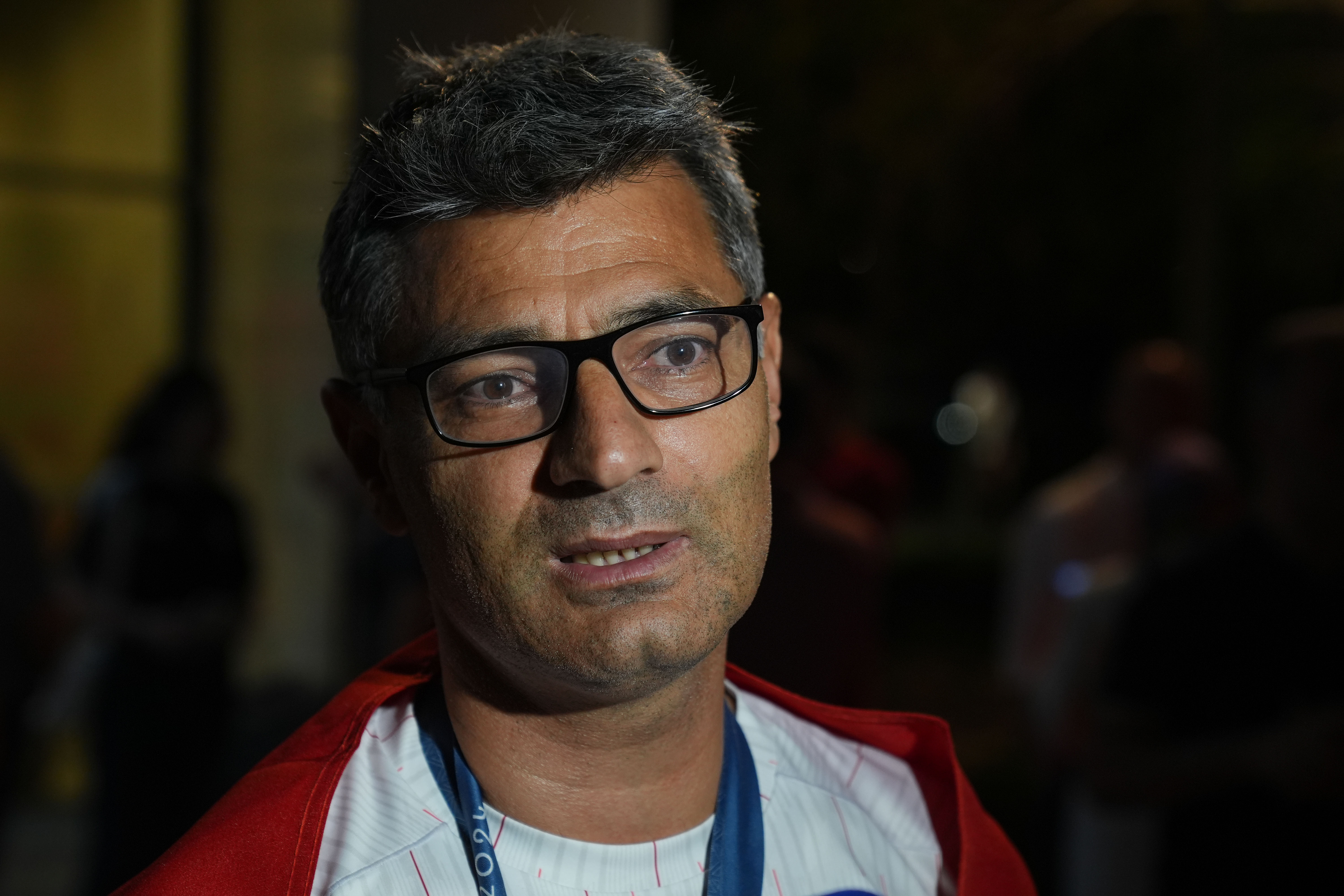 Yusuf Dikeç, a Turkish Olympic silver medalist shooter who shoots without special equipment, after arriving at Esenboga Airport in Ankara, Turkiye, on August 1, 2024 | Source: Getty Images