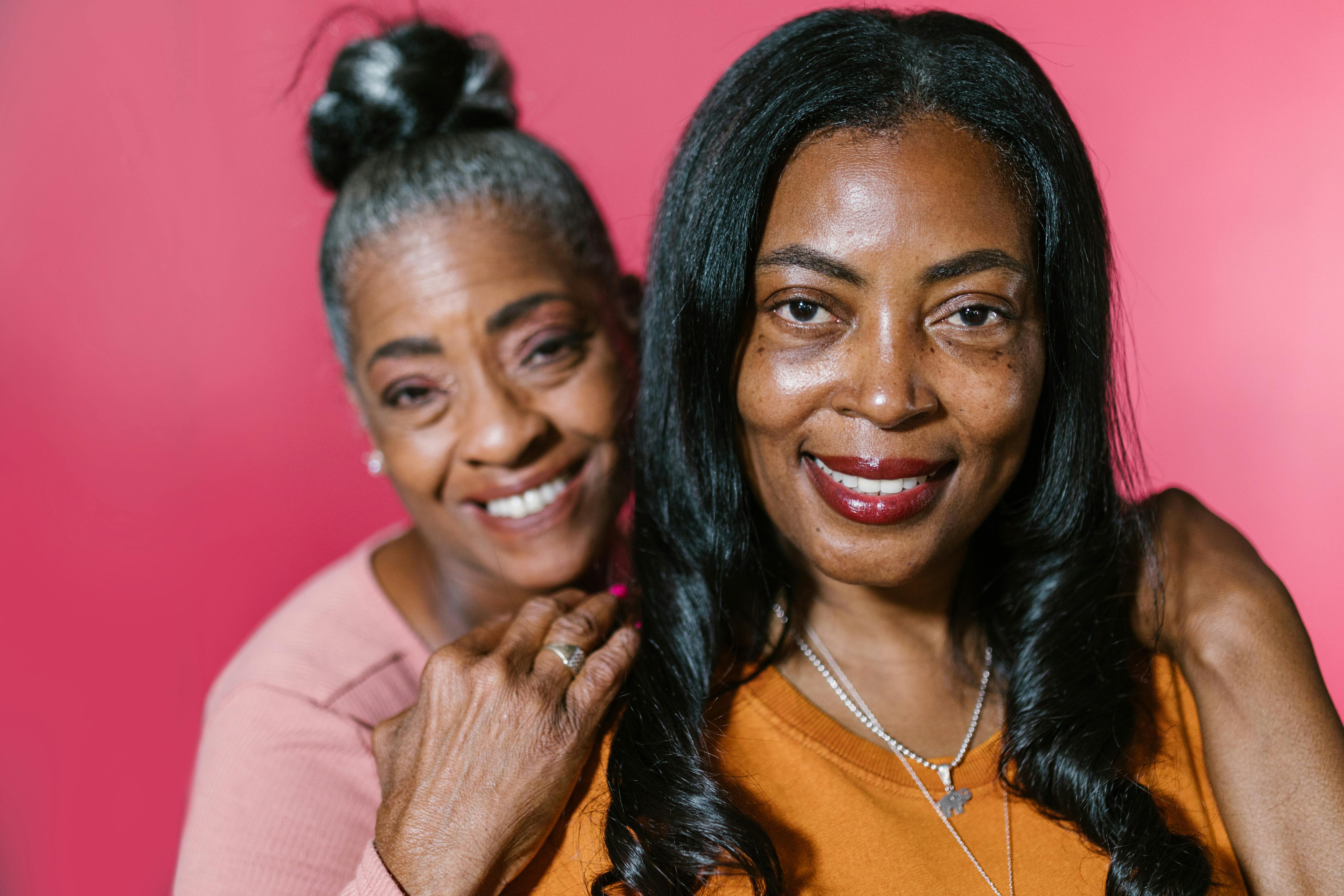 An older and younger woman sharing an apparently strong bond | Source: Pexels