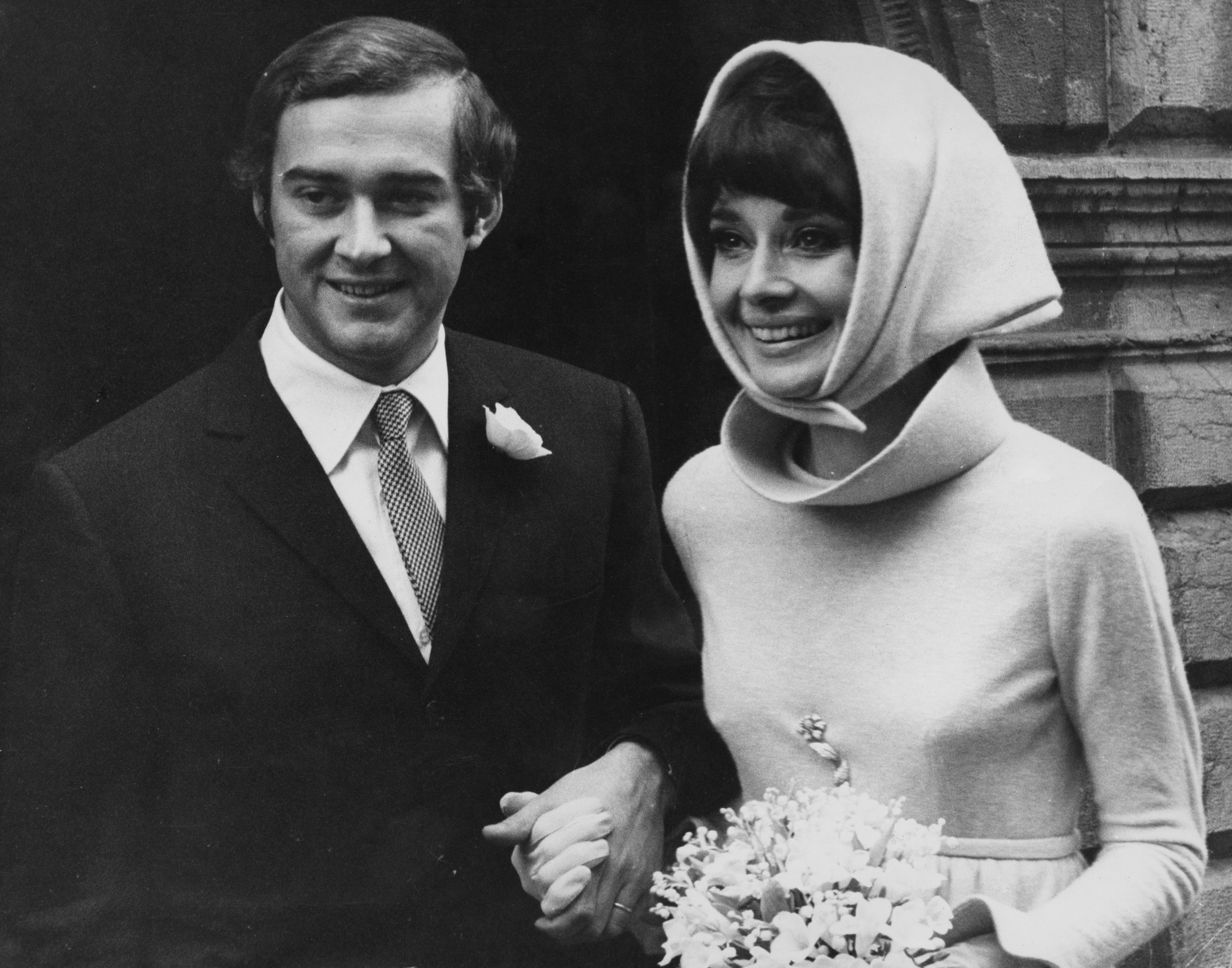 Belgian-born actress Audrey Hepburn (1929 - 1993) with her second husband, Italian psychiatrist Andrea Dotti (1938 - 2007), after their wedding in Morges, Switzerland, 18th January 1969. | Source: Getty Images