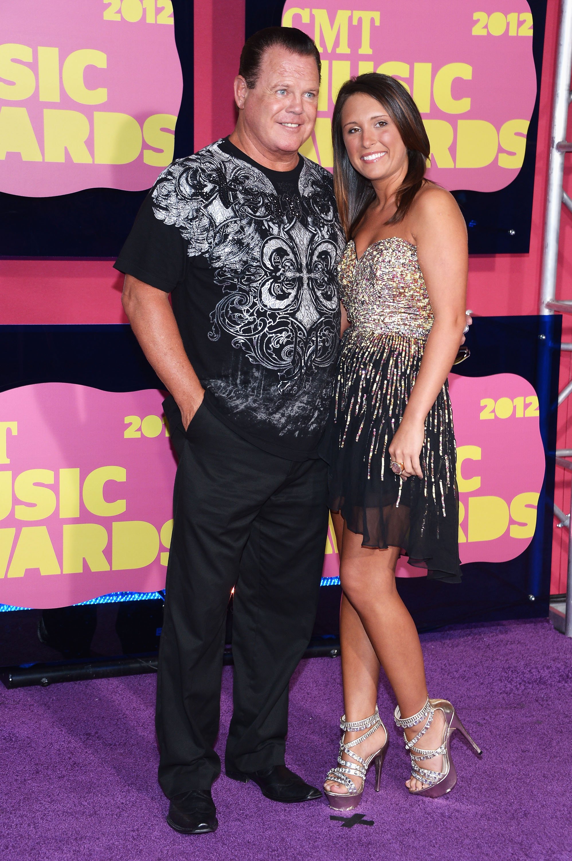  Jerry Lawler and Lauryn McBride at the Bridgestone Arena on June 6, 2012, in Nashville, Tennessee. | Source: Getty Images