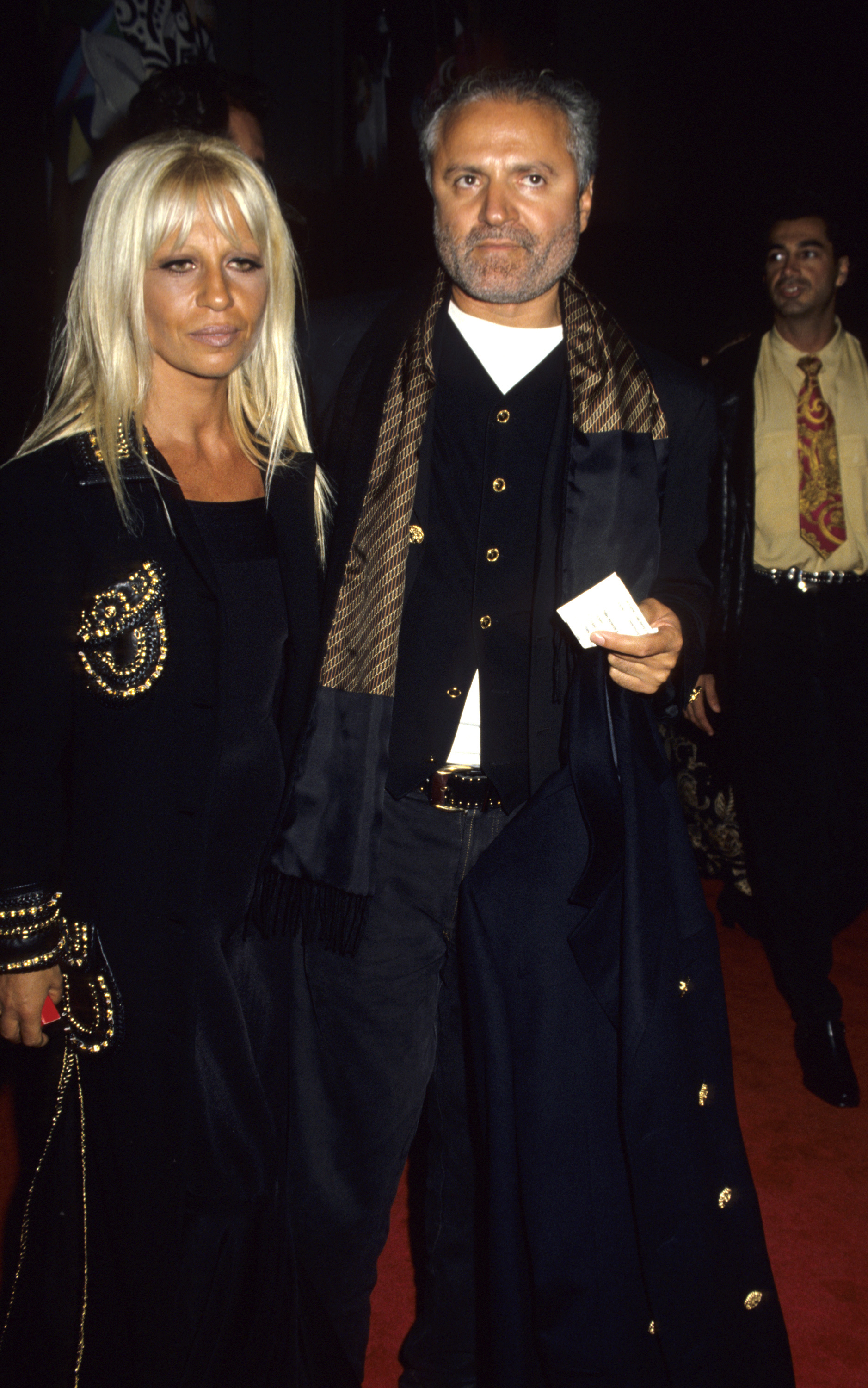 Gianni Versace, 45, and Donatella Versace, 37, attended the "Versace Signatures" exhibition on November 5, 1992, in New York City. Donatella's face showed initial cheek tightening and subtly increased lip volume, giving her a pronounced angularity.