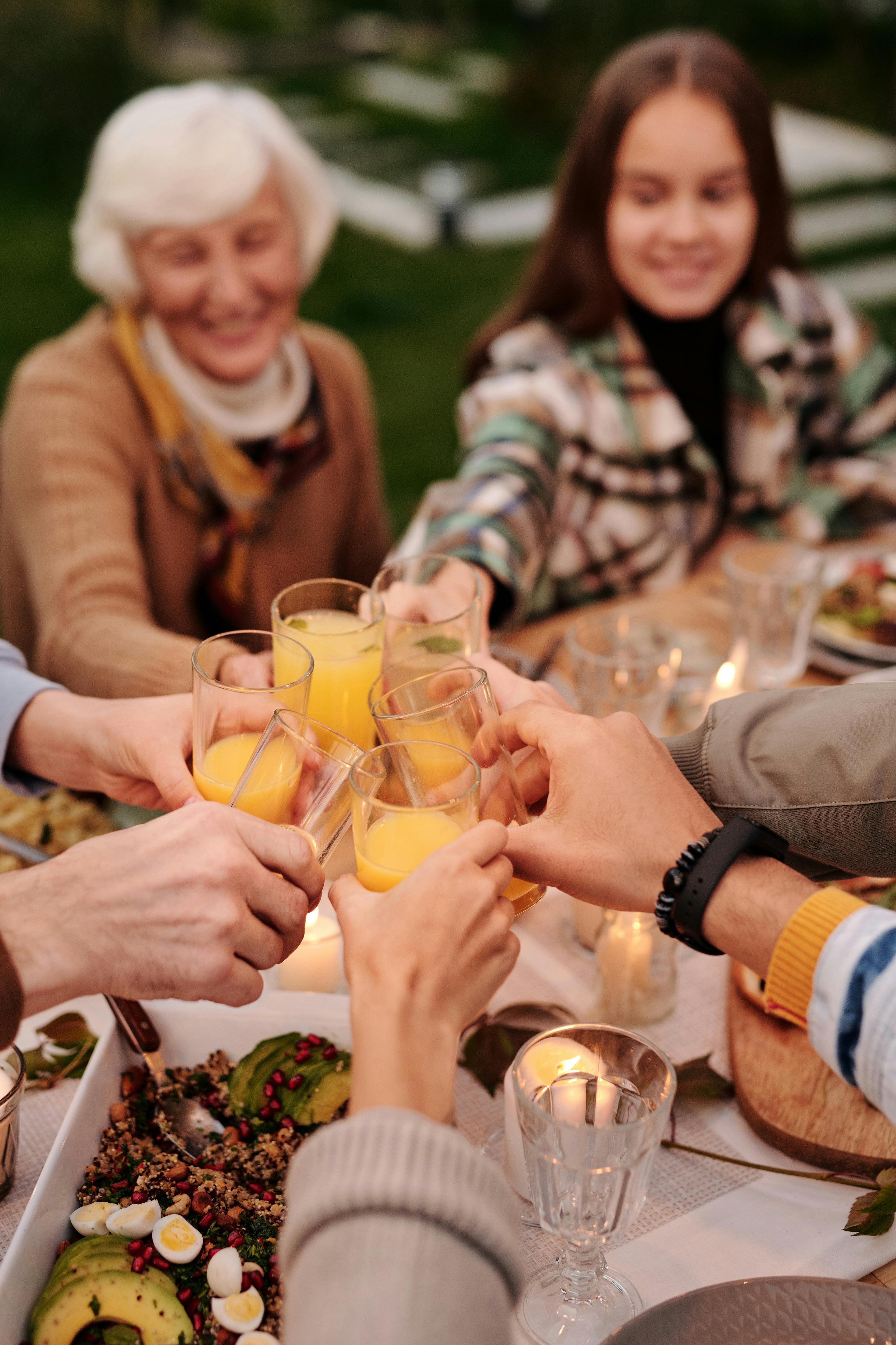 People toasting at a birthday party | Source: Pexels
