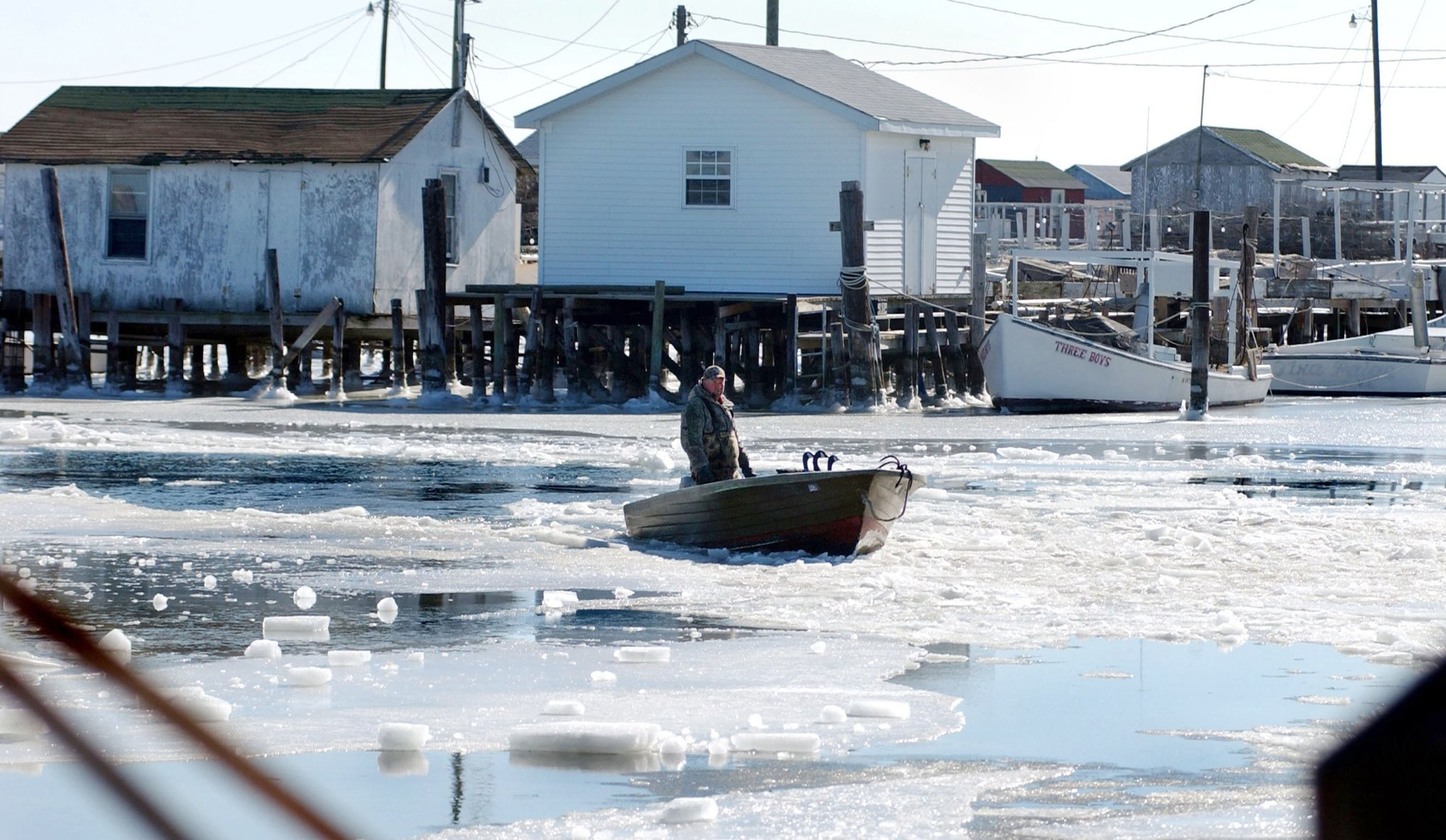 A man navigates through broken ice | Source: Getty Images