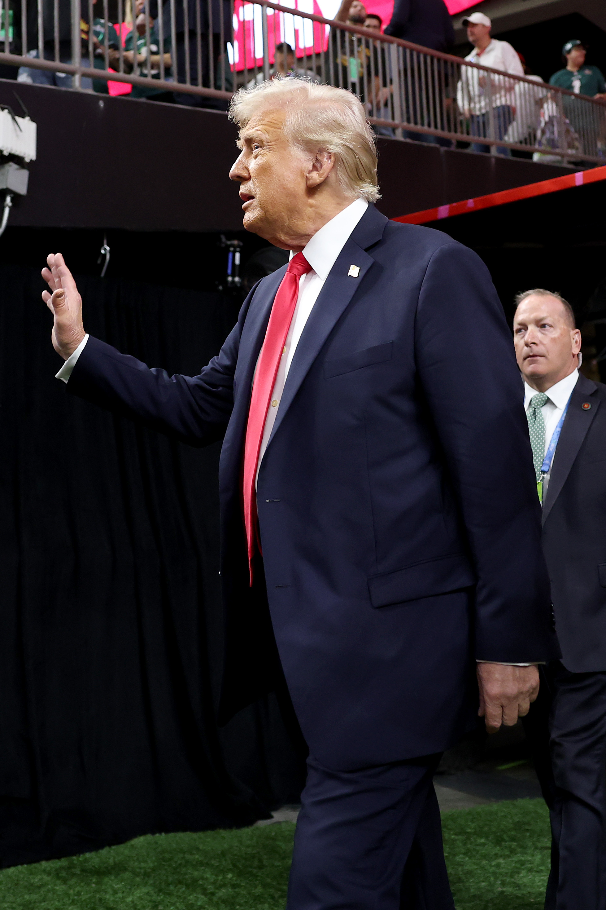 U.S. President Donald Trump walks onto the field prior to Super Bowl LIX between the Kansas City Chiefs and the Philadelphia Eagles on February 9, 2025, in New Orleans, Louisiana | Source: Getty Images