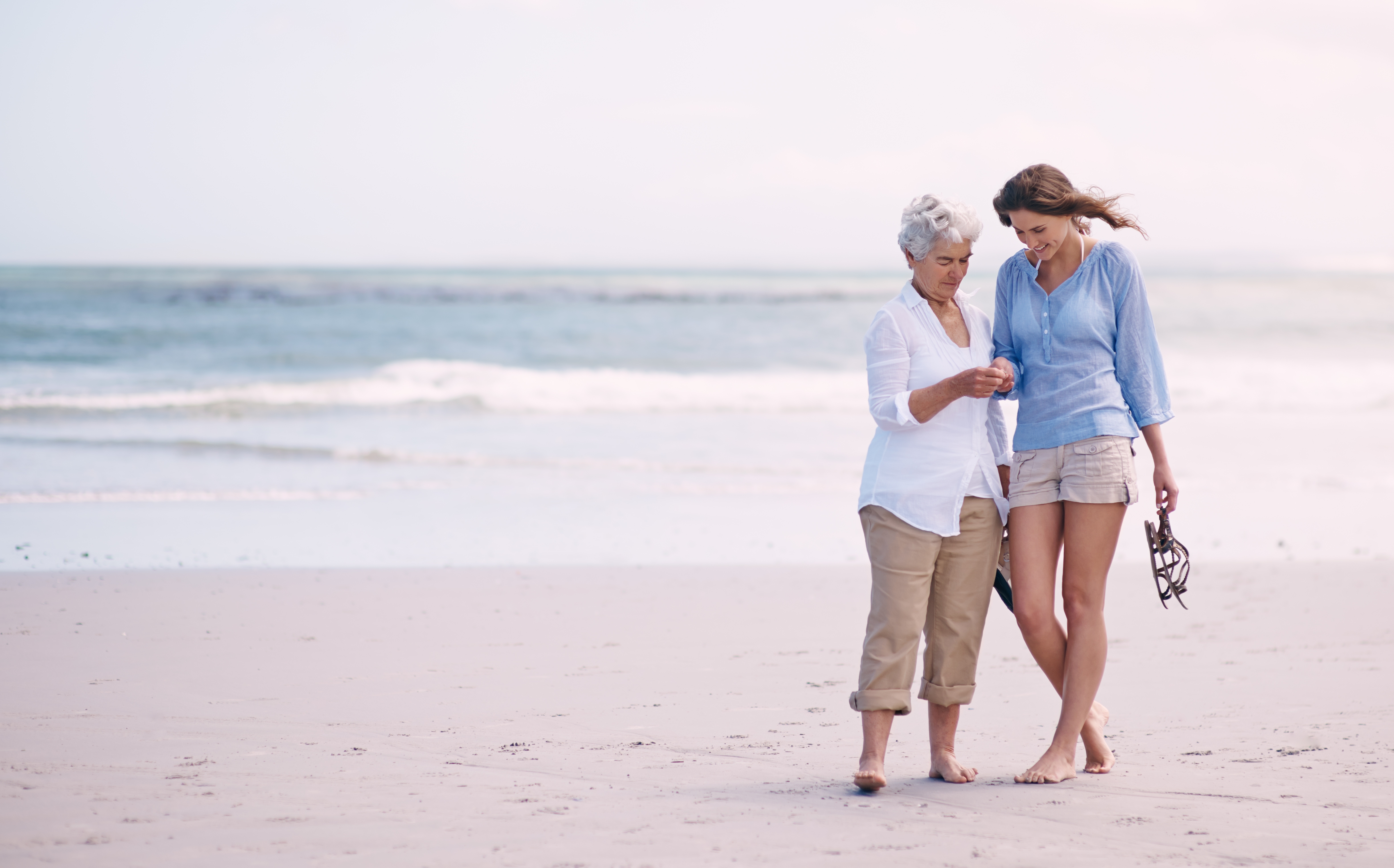 Mother and daughter spending quality time at the beach | Source: Shutterstock