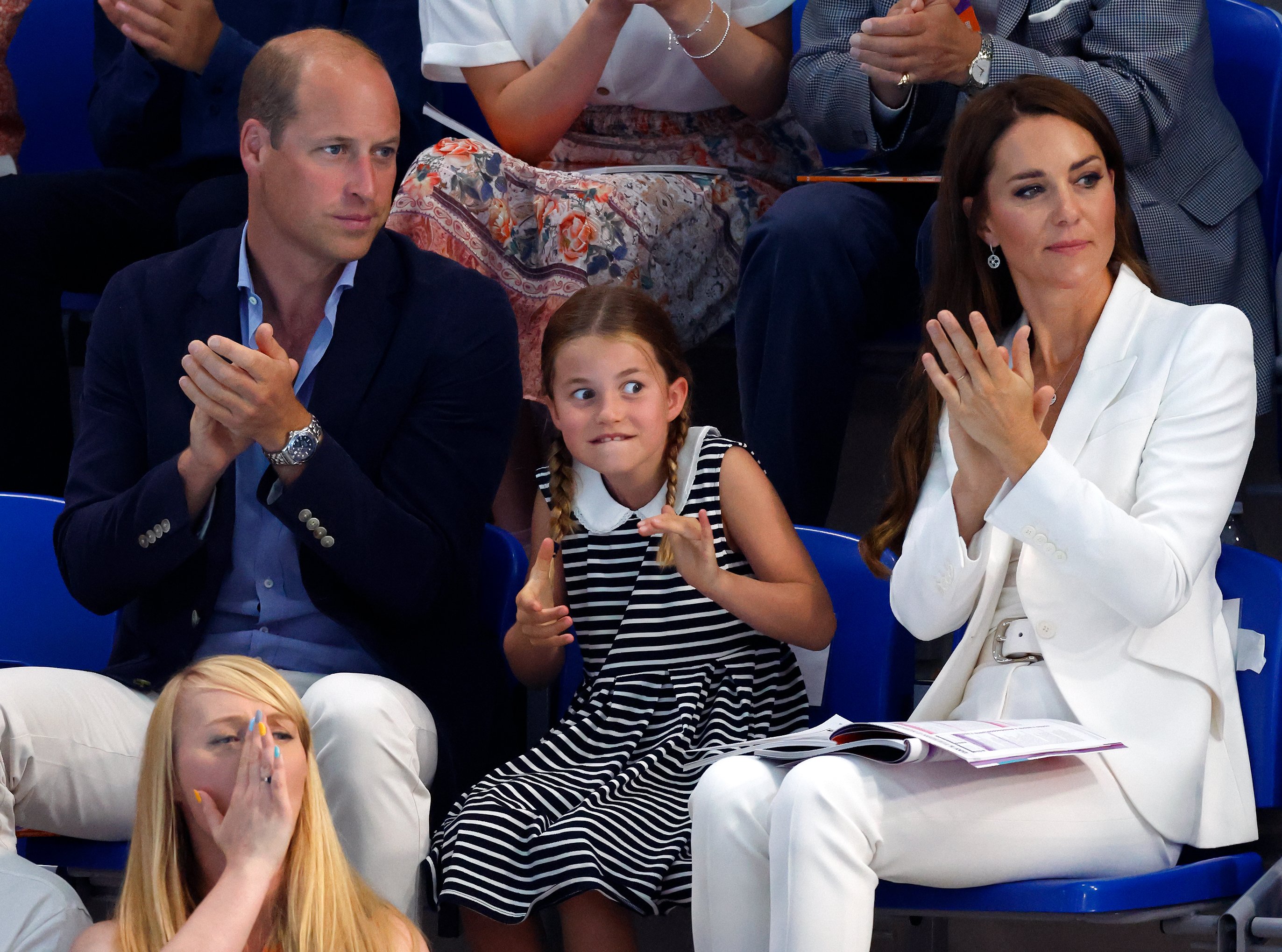 Prince William, Princess Charlotte, and Duchess Kate watch the swimming competition during the Commonwealth Games on August 2, 2022, in Birmingham, England | Source: Getty Images