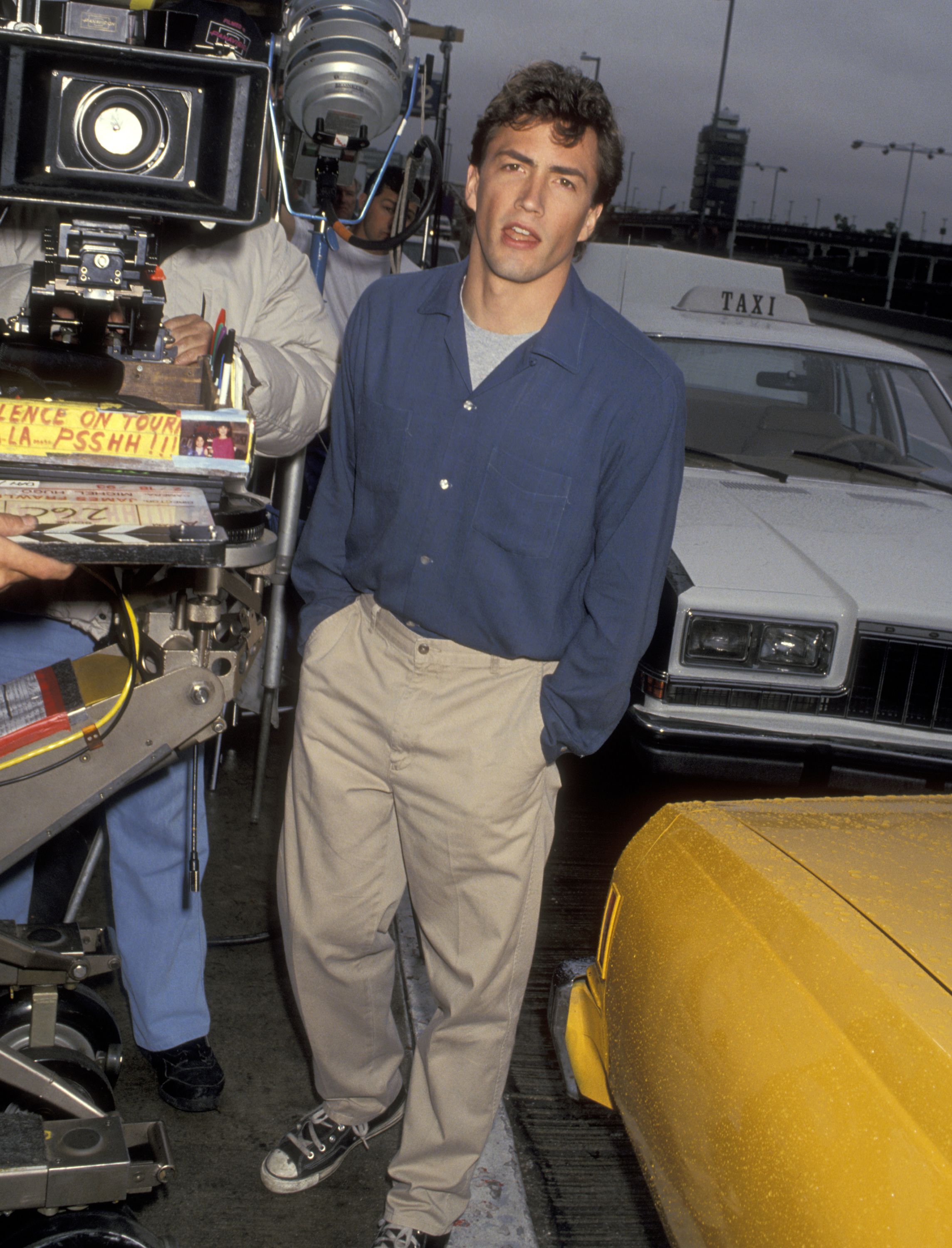 The actor is captured on set during the filming of "Melrose Place" at Los Angeles International Airport on February 18, 1993 | Source: Getty Images