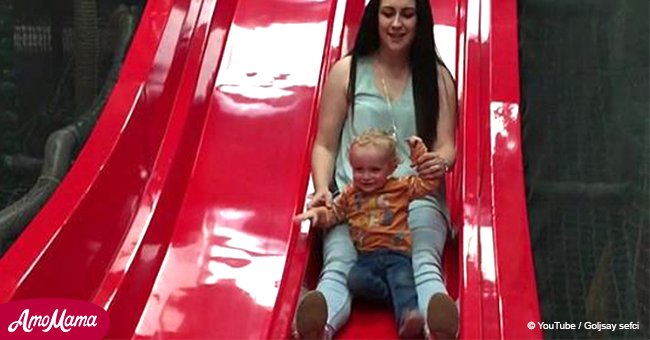 18-month-old baby snaps leg when mother takes him down a slide on her lap