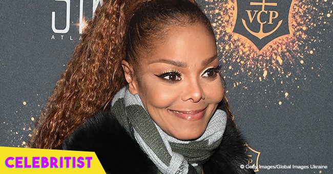 Janet Jackson glows with happiness in all black outfit while talking on phone in new pics