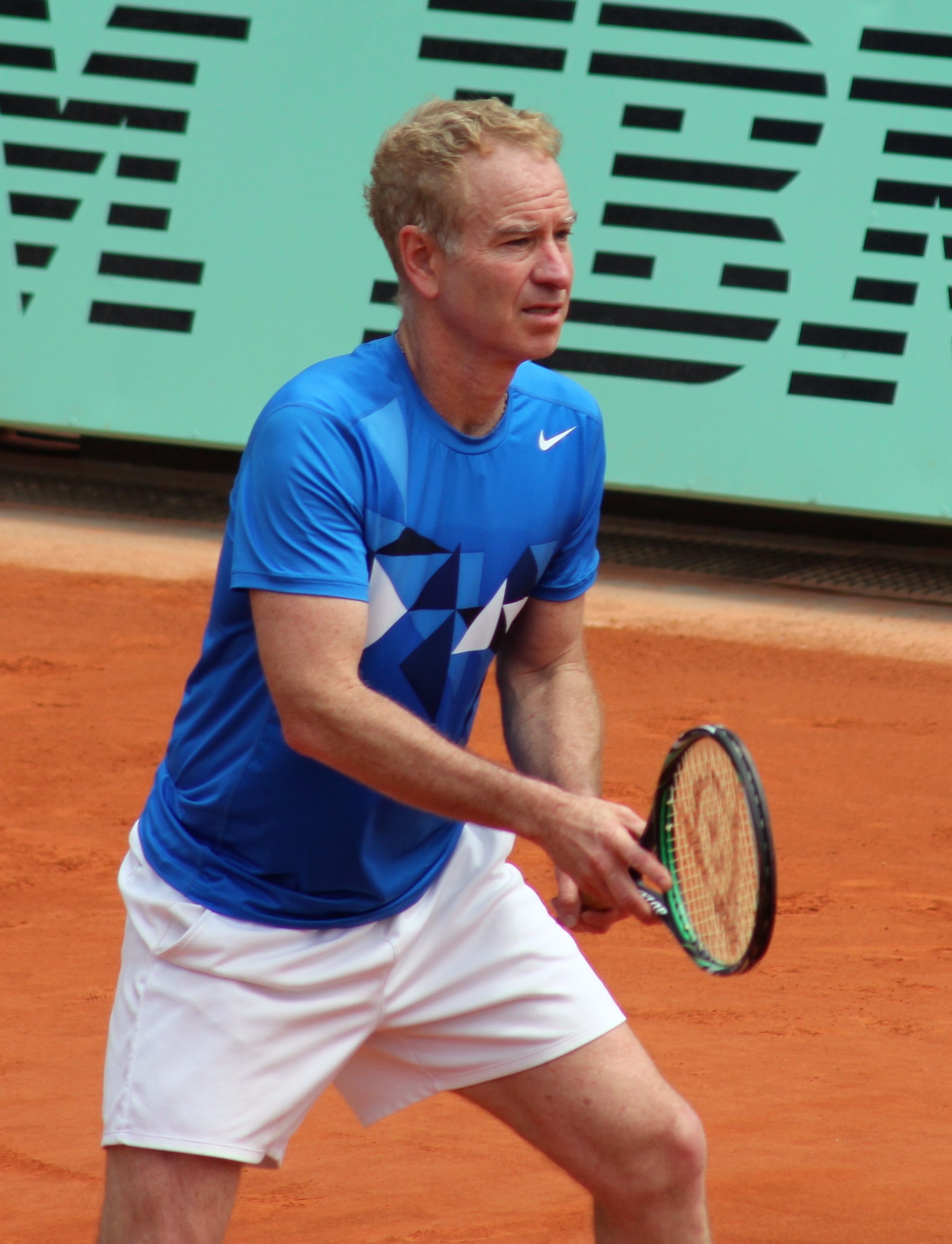 John McEnroe at the 2012 French Open – Legends Over 45 Doubles | Photo By Pruneau - Own work, CC BY-SA 3.0, Wikimedia Commons Images