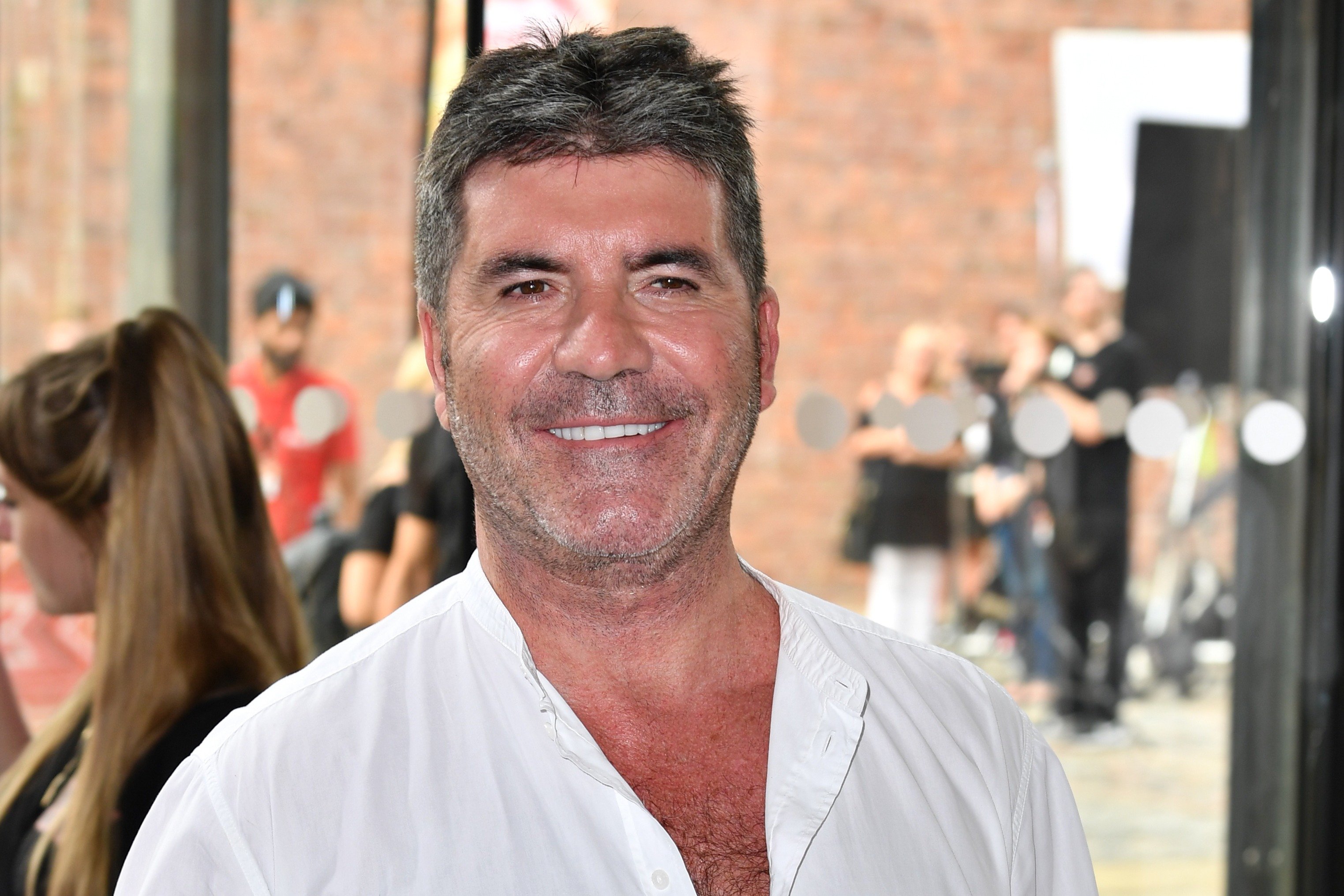 Music producer Simon Cowell attends the first day of the "X-Factor" auditions at the Titanic Hotel in Liverpool, England on June 20, 2017. | Photo: Getty Images