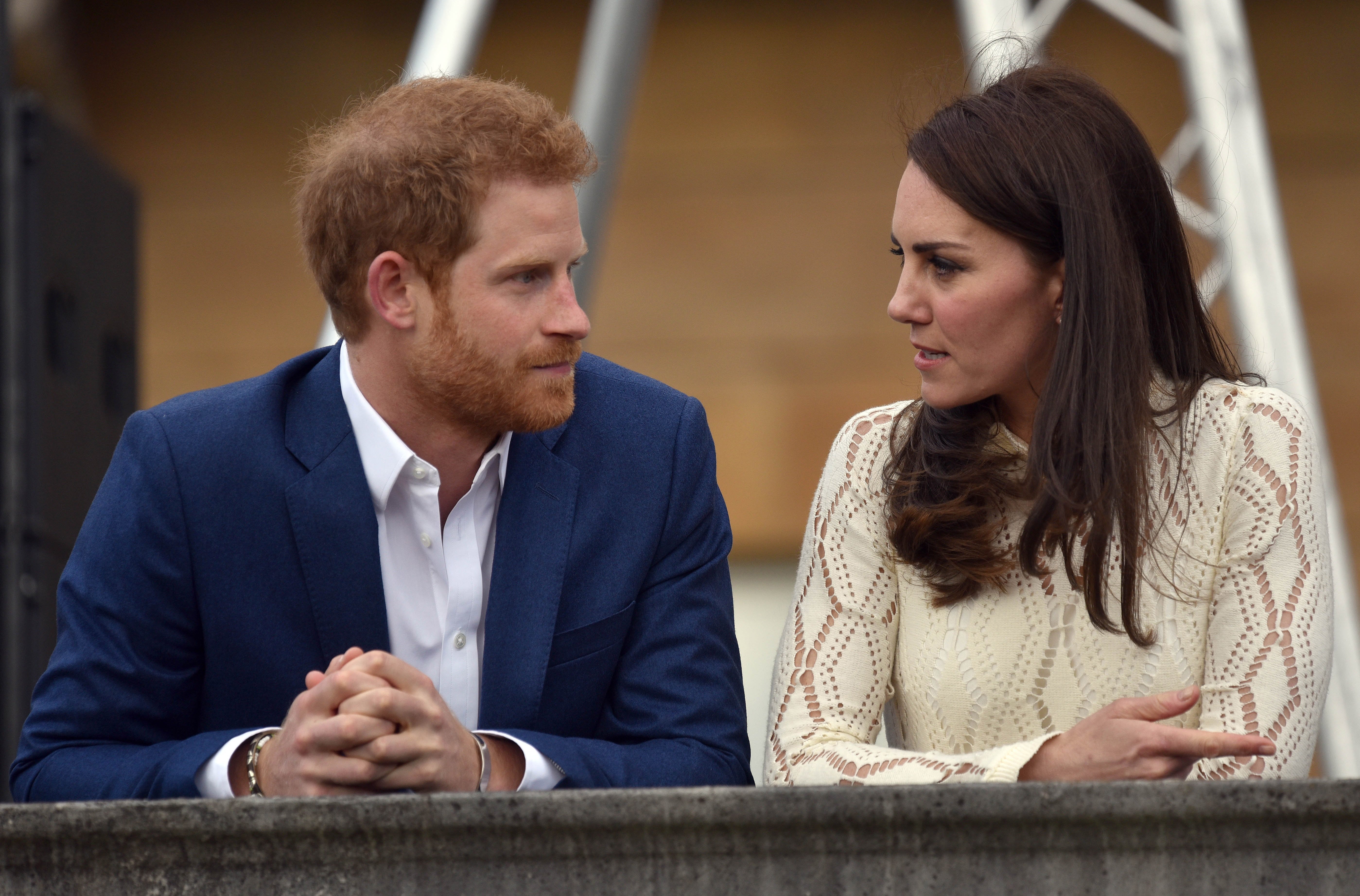 Kate Middleton and Prince Harry pictured in conversation at a tea party in the grounds of Buckingham Palace on May 13, 2017 in London, England. / Source: Getty Images