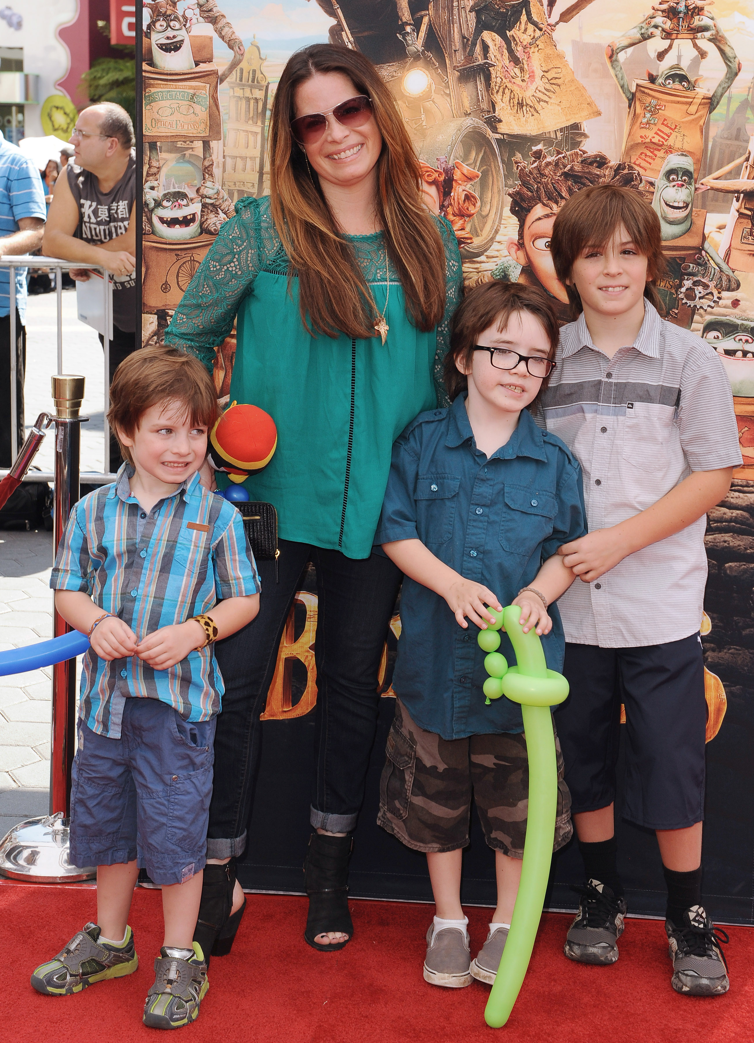 Holly Marie Combs and her sons, Finley, Riley, and Kelley Donoho, at the "The Boxtrolls" premiere in Universal City, California, on September 21, 2014 | Source: Getty Images