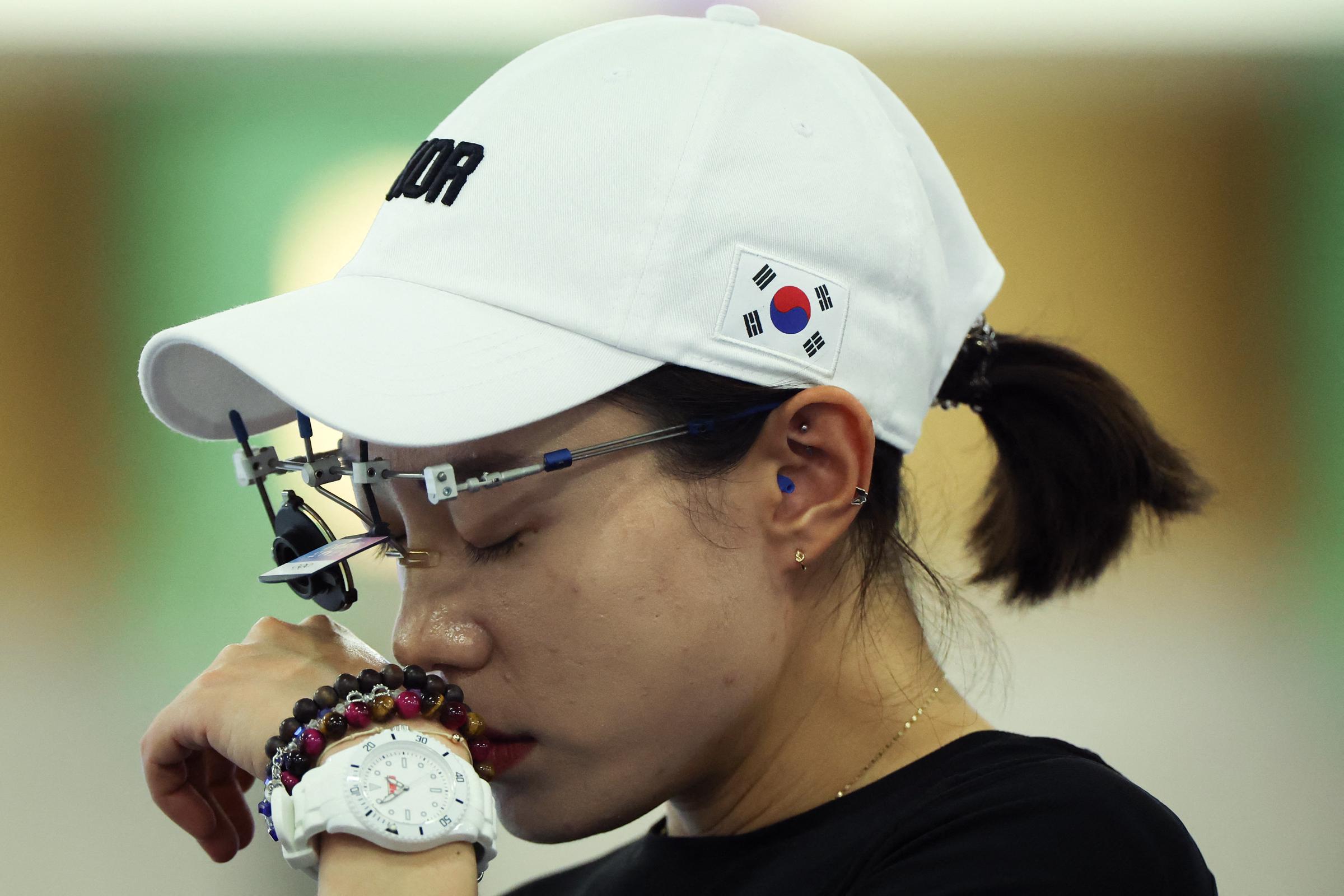 Kim Yeji reacts during the 10m air pistol women's qualification at the Paris Olympic Games on July 27, 2024 | Source: Getty Images