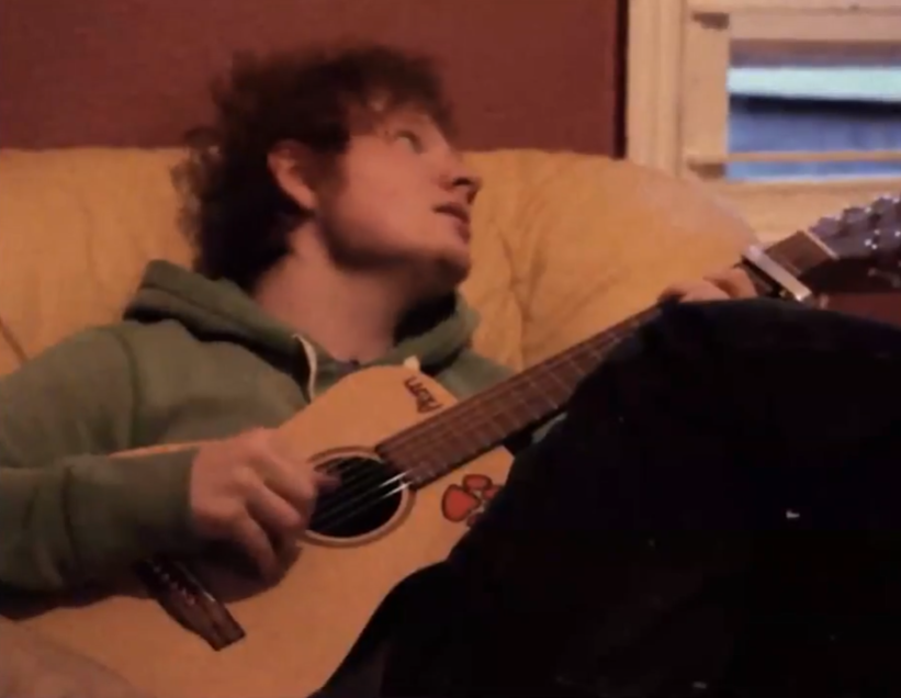 Young Ed Sheeran in his "Photograph" music video, published 10 May 2015. | Source: YouTube/Cleyver Music