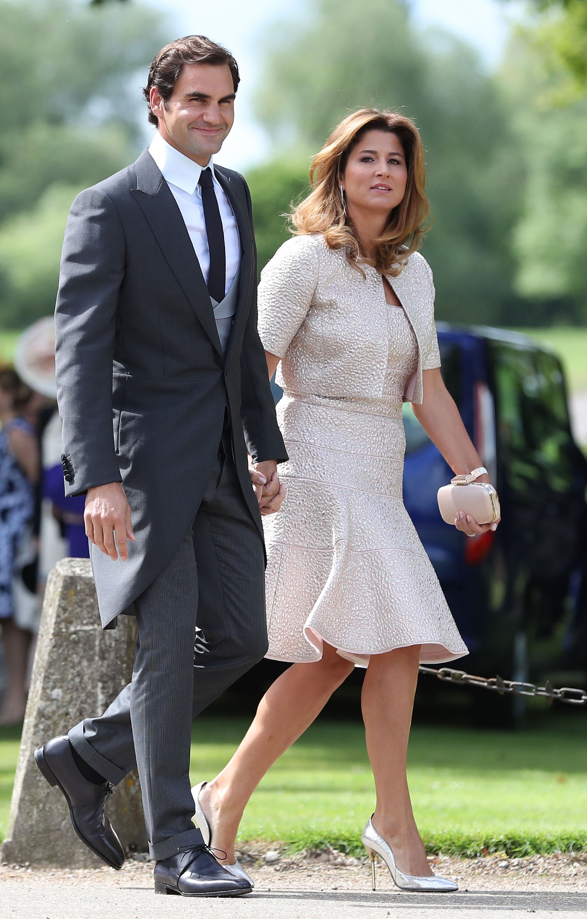 Roger Federer and his wife Mirka arrive ahead of the wedding of the Duchess of Cambridge's sister Pippa Middleton at St. Mark's church in Englefield, Berkshire. | Source: Getty Images