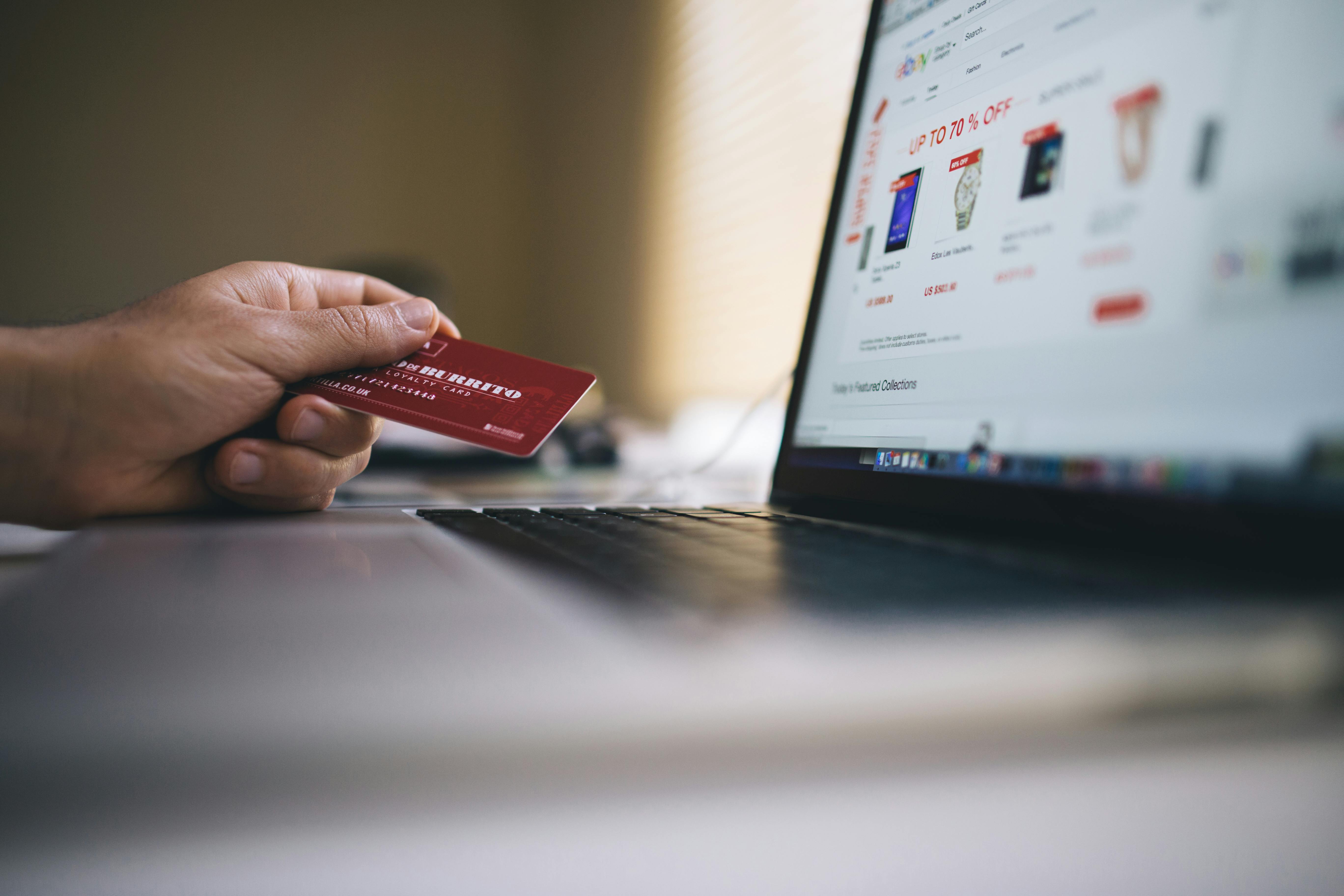 A person using their credit card to purchase online | Source: Pexels