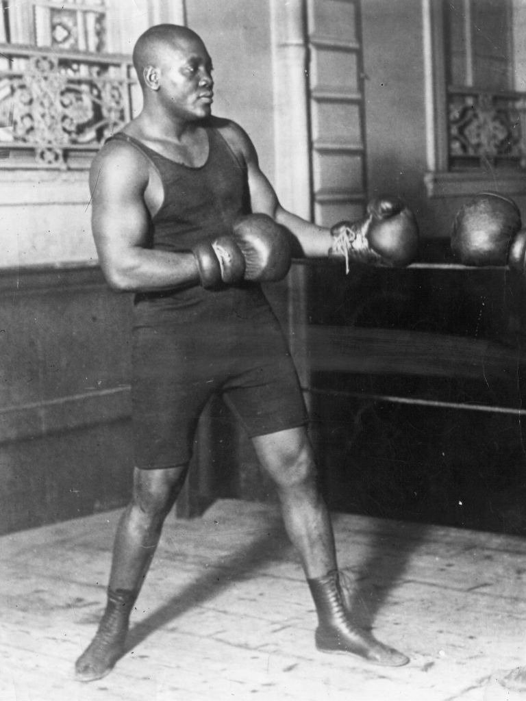 American heavyweight boxer Jack Johnson in action sparring | Photo: Getty Images