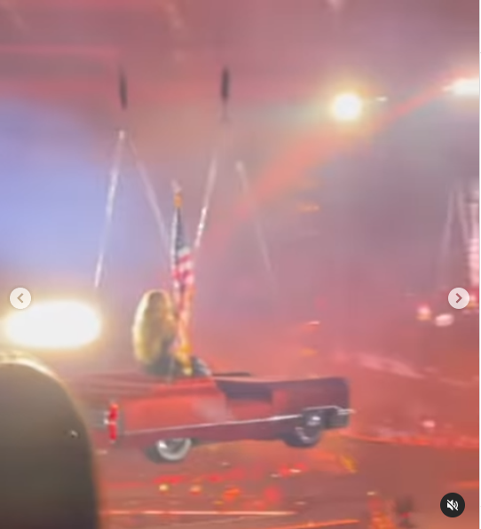 A photo taken from a video showing Beyoncé riding on a floating American-style car across the stage during her concert in Los Angeles posted on May 10, 2025 | Source: Instagram/meghan