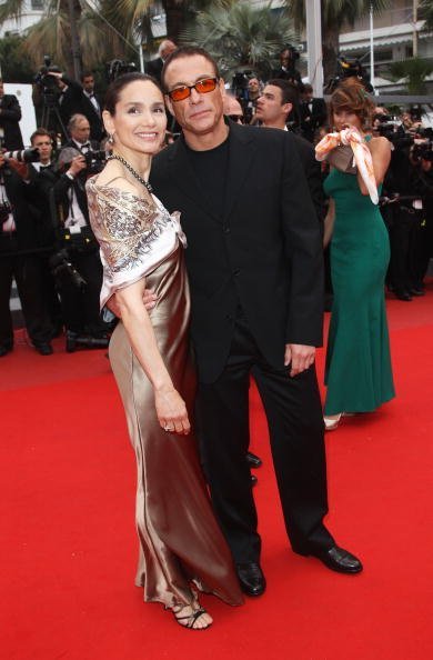 Jean Claude Van Damme and Gladys Portugues attend the "You Will Meet A Tall Dark Stranger" Premiere at the Palais des Festivals during the 63rd Annual Cannes Film Festival on May 15, 2010, in Cannes, France. | Source: Getty Images.