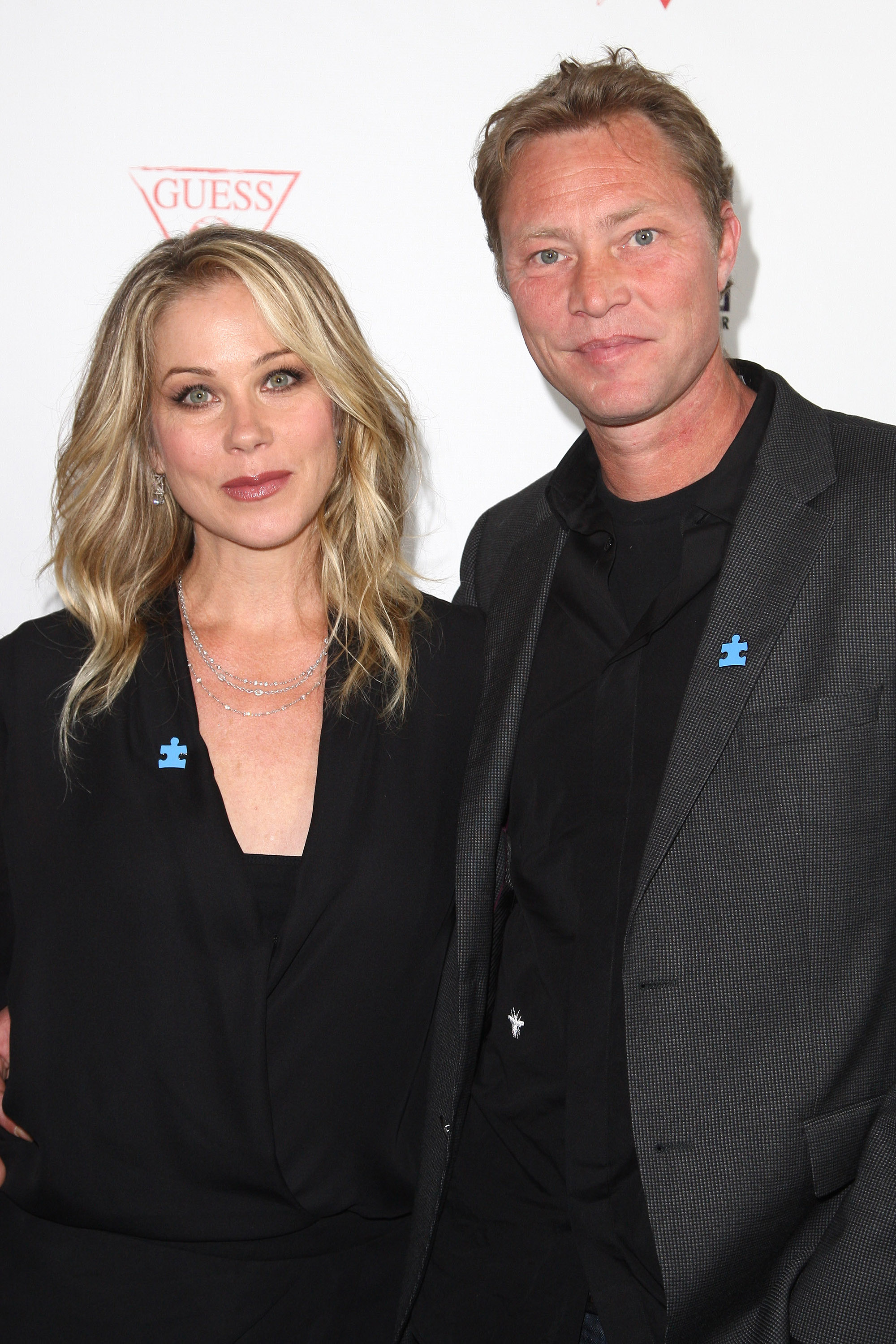 Christina Applegate and Martyn LeNoble attend the 3rd Light Up The Blues Concert to benefit Autism Speaks held at the Pantages Theatre in Hollywood, California, on April 25, 2015. | Source: Getty Images