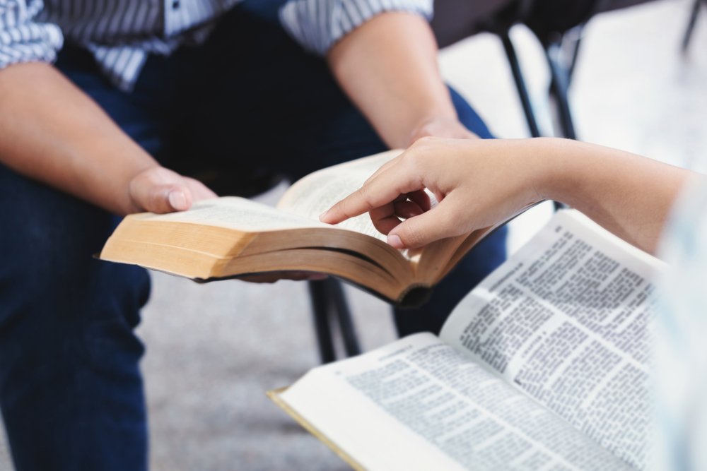 Holy Bible study reading together in Sunday school  | Getty Images