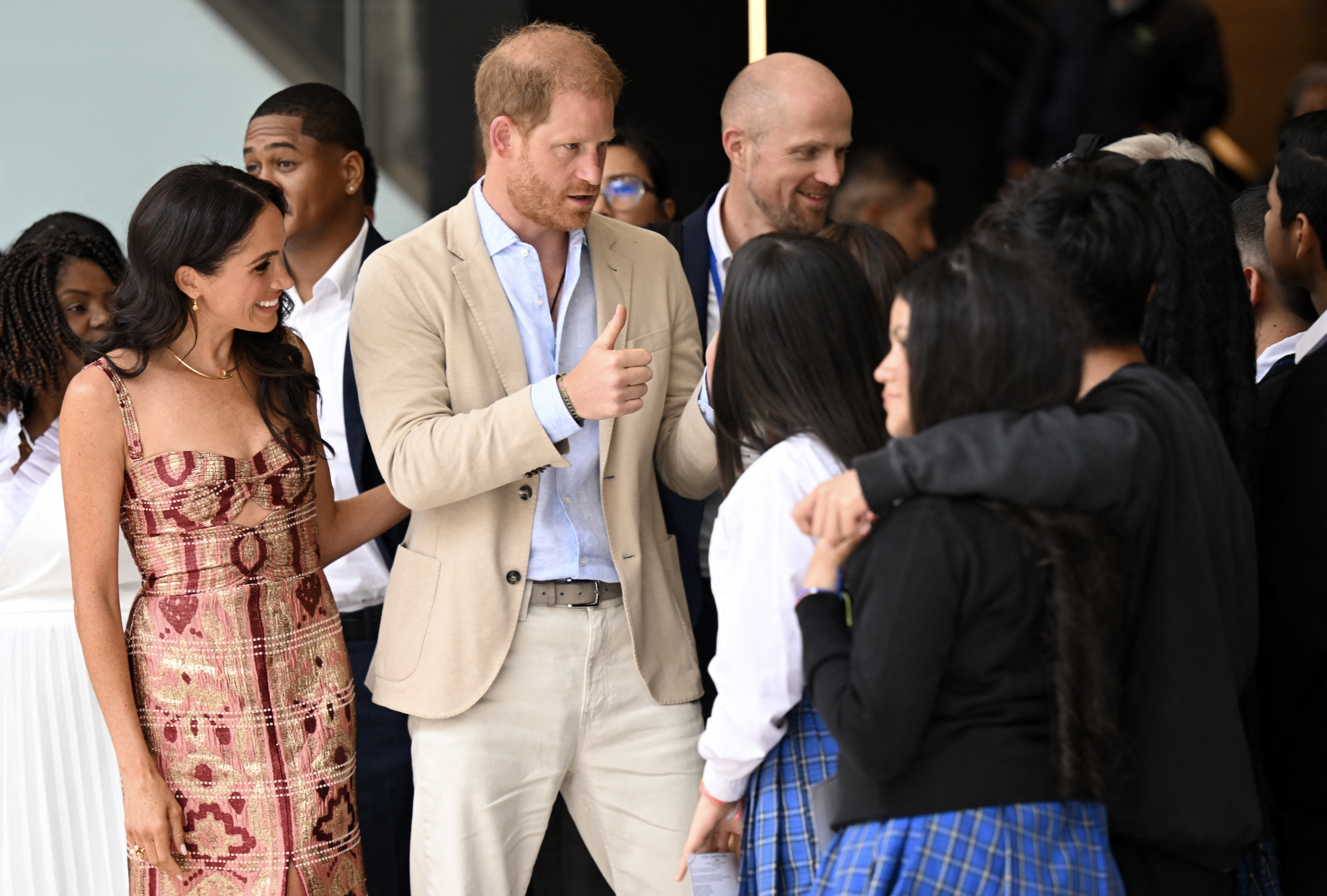 Meghan Markle and Prince Harry talks to the tudents at the National Centre for the Arts in Bogotá on August 15, 2024 | Source: Getty Images