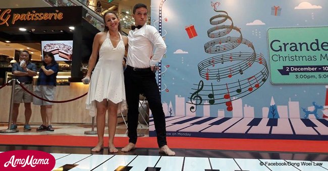 These musicians play a complicated song by dancing on a giant piano