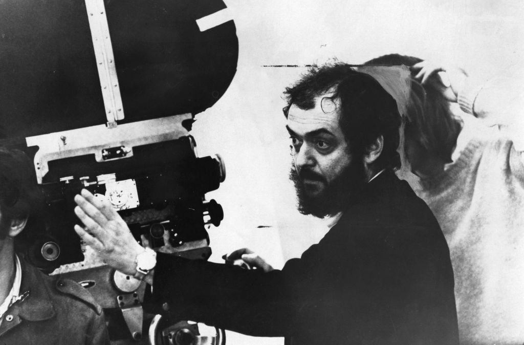 American film director Stanley Kubrick looking through a movie camera | Getty Images