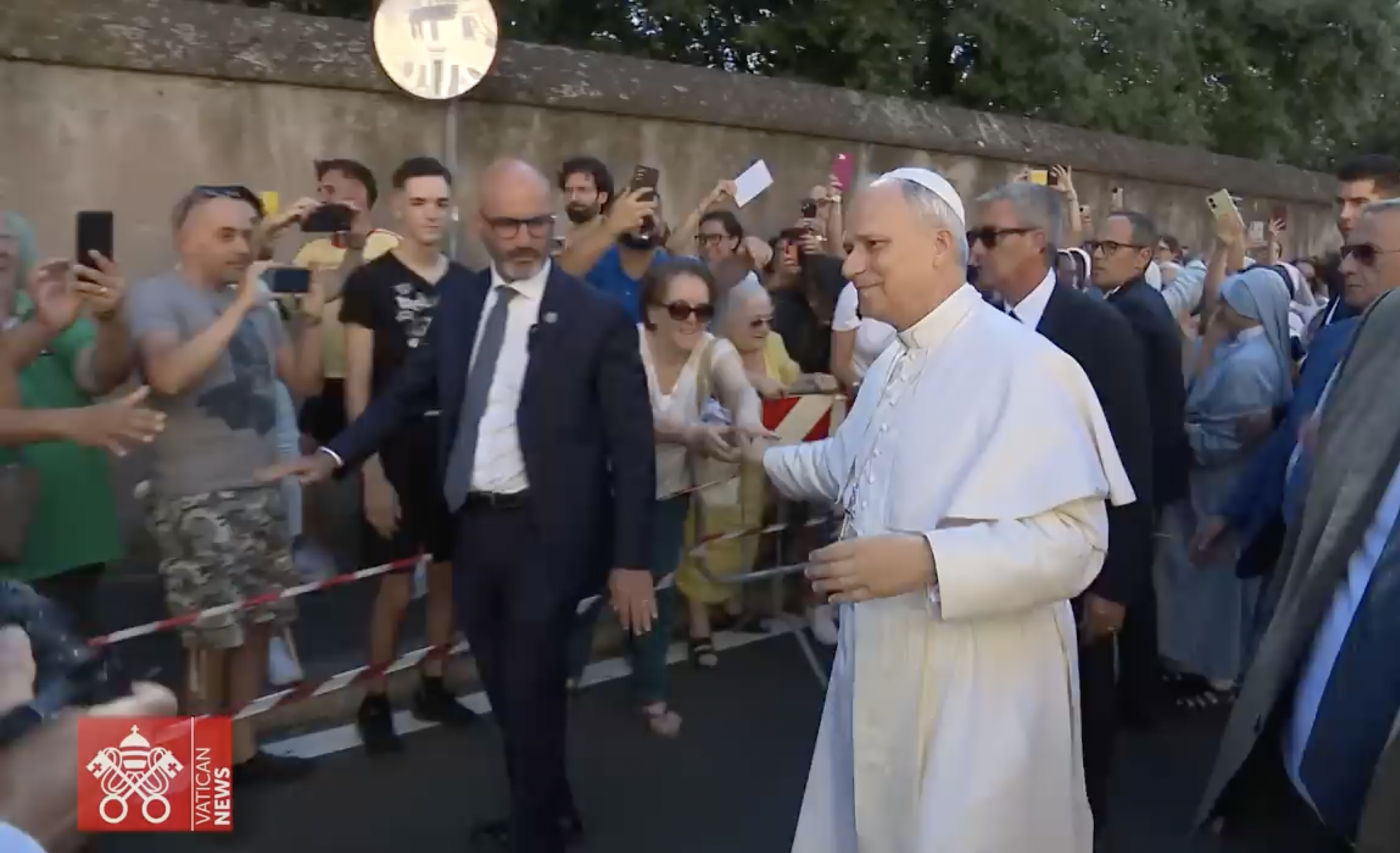 Pope Leo XIV greets supporters upon arrival at Castel Gandolfo, dated July 2025 | Source: YouTube/VaticanNews