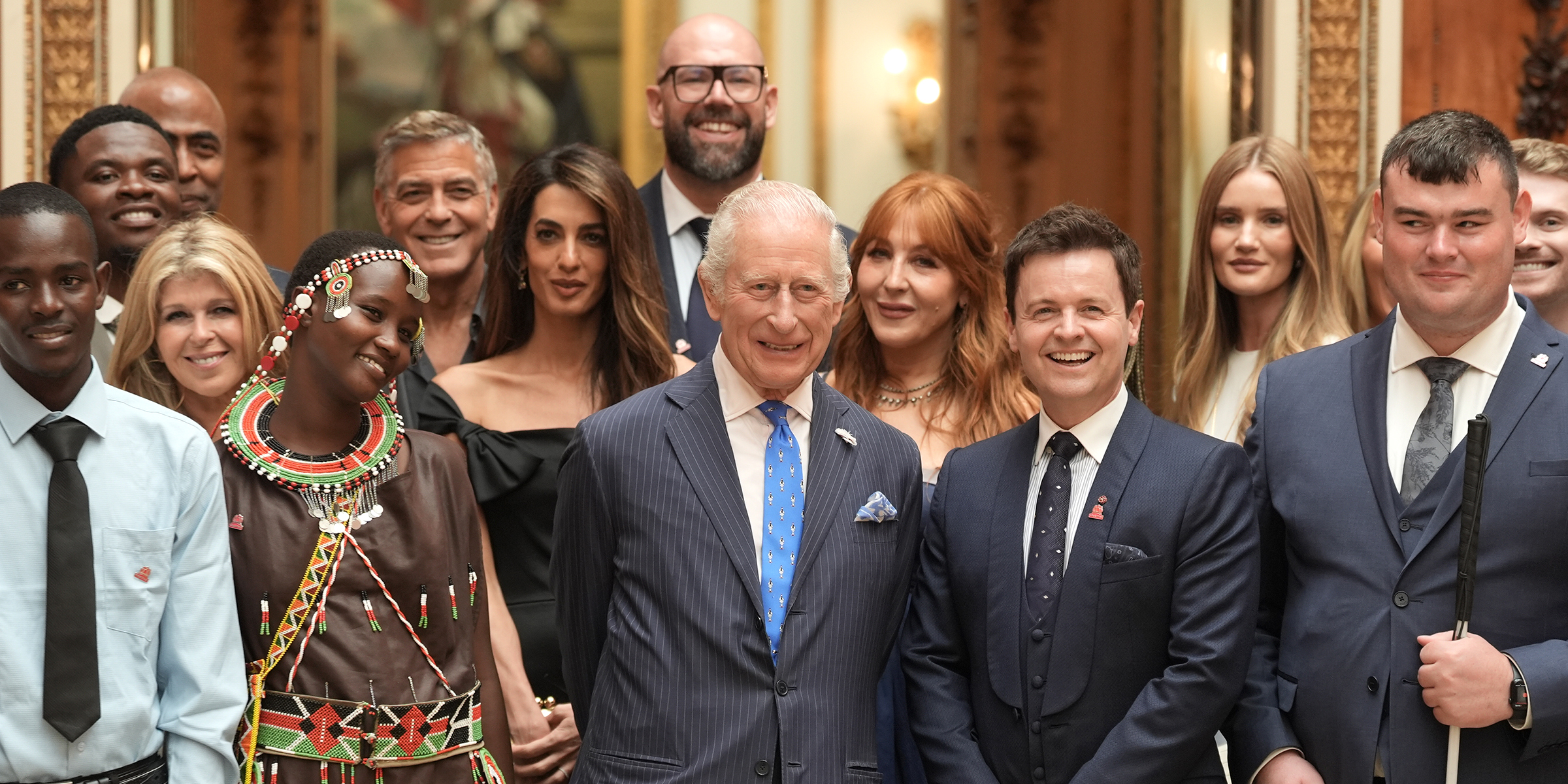 George and Amal Clooney with King Charles III and other guests | Source: Getty Images