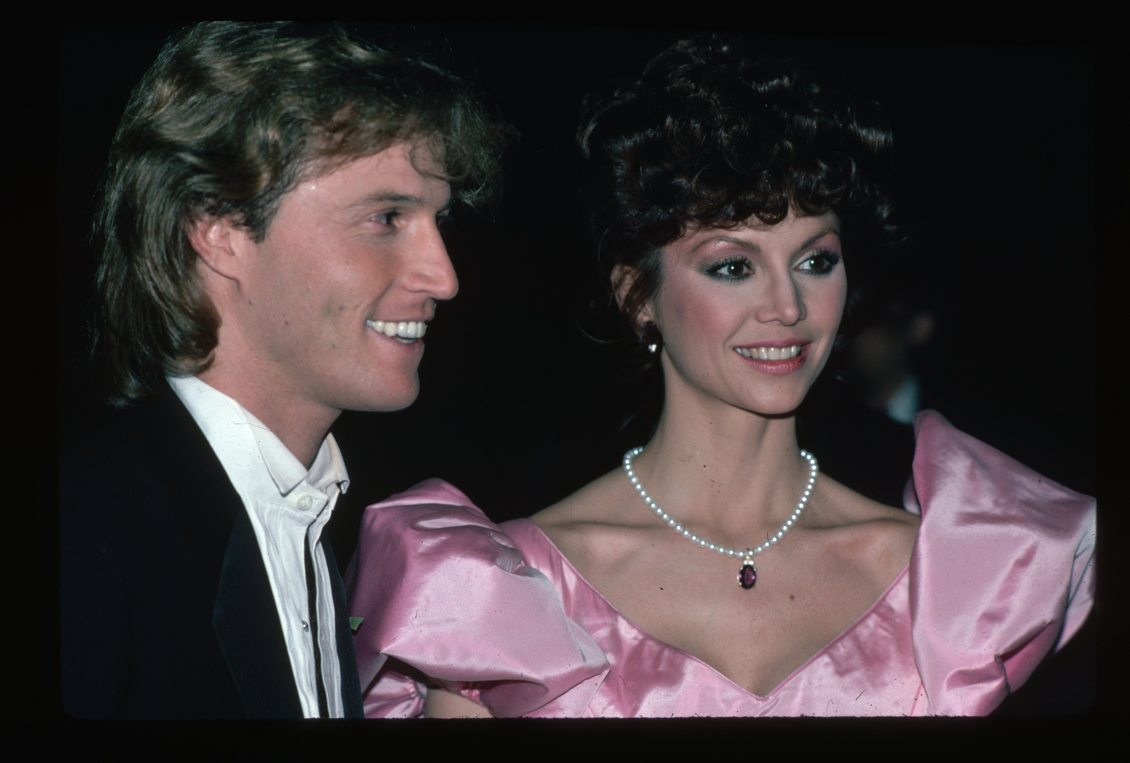  Picture shows actress, Victoria Principal, and singer, Andy Gibb, posing together. | Source: Getty Images