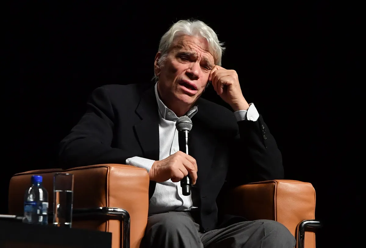 L'homme d'affaires et ancien politicien français Bernard Tapie s'exprime lors d'une conférence à la Chambre de commerce de Liège, le 27 septembre 2018. | Photo : Getty Images