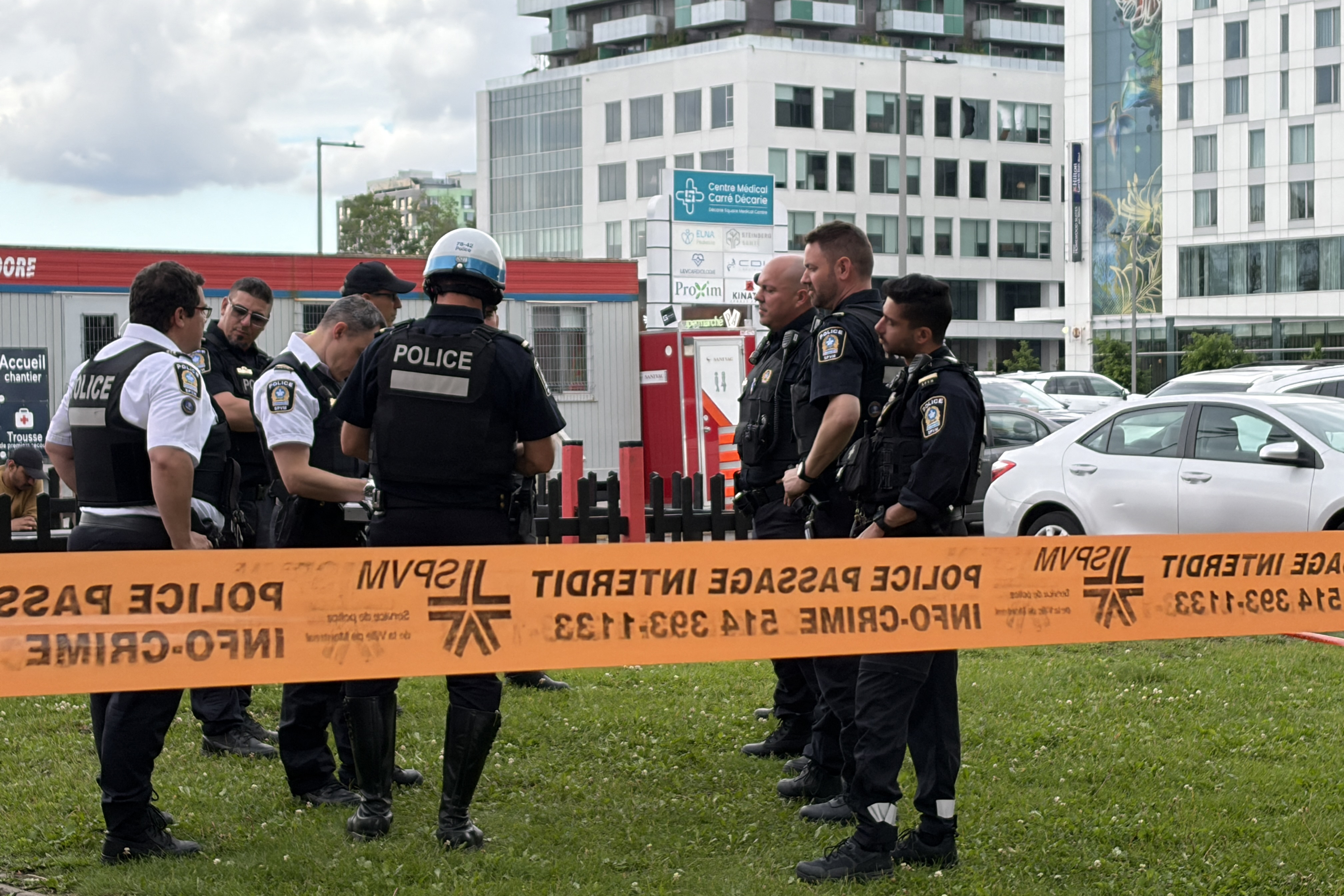 Police officers secured the area after the shooting left a police officer, a civilian and the suspected gunman dead. As investigators examined the scene, questions remained about who the suspect intended to target and how the attack unfolded. | Source: Getty Images