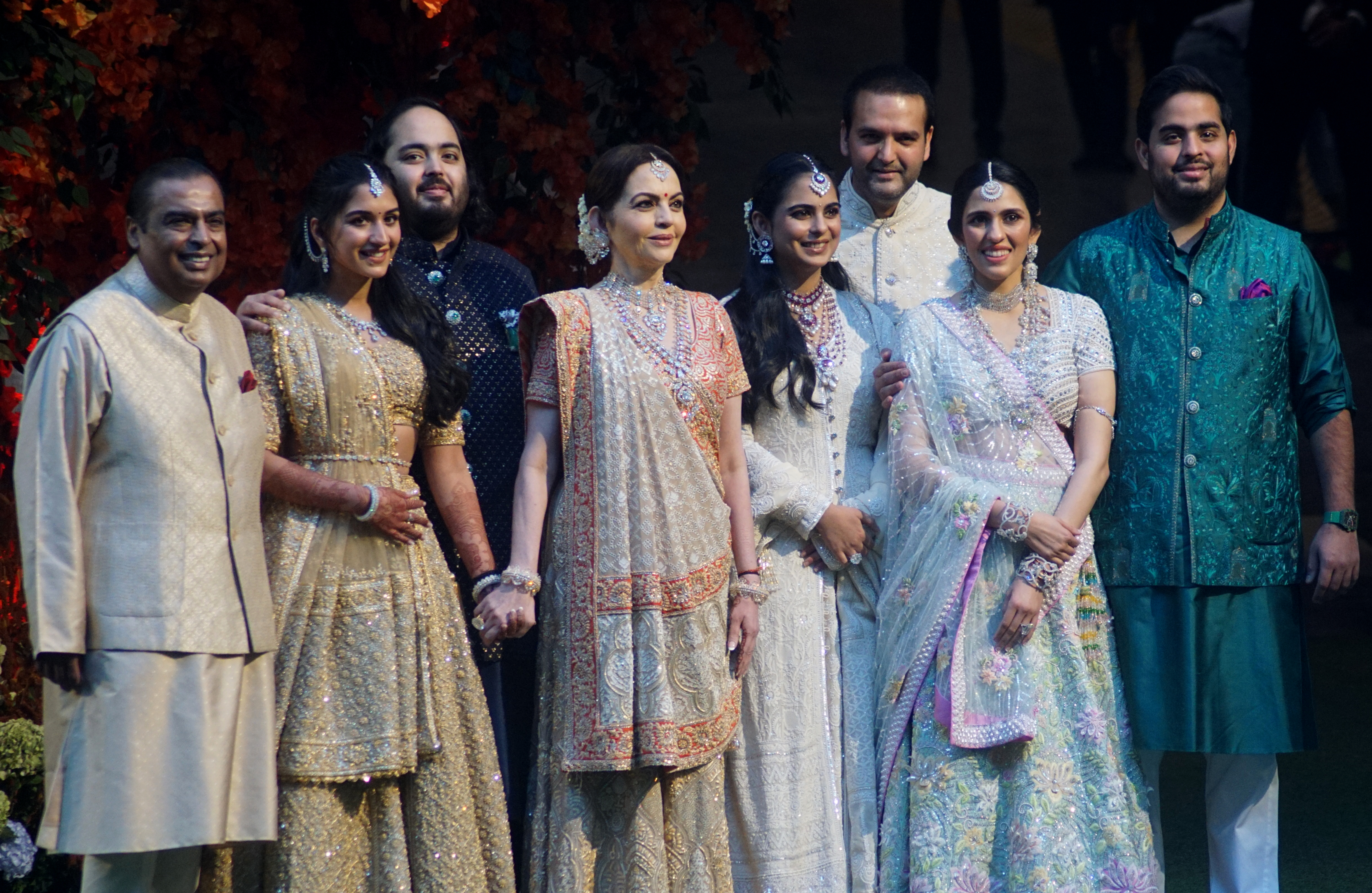 From L-R: Mukesh Ambani, Radhika Merchant, Anant, Nita and Isha Ambani, Anand Piramal, Shloka Mehta and Akash Ambani at the engagement ceremony of Anant and Radhika on January 19, 2023 in Mumbai, India | Source: Getty Images