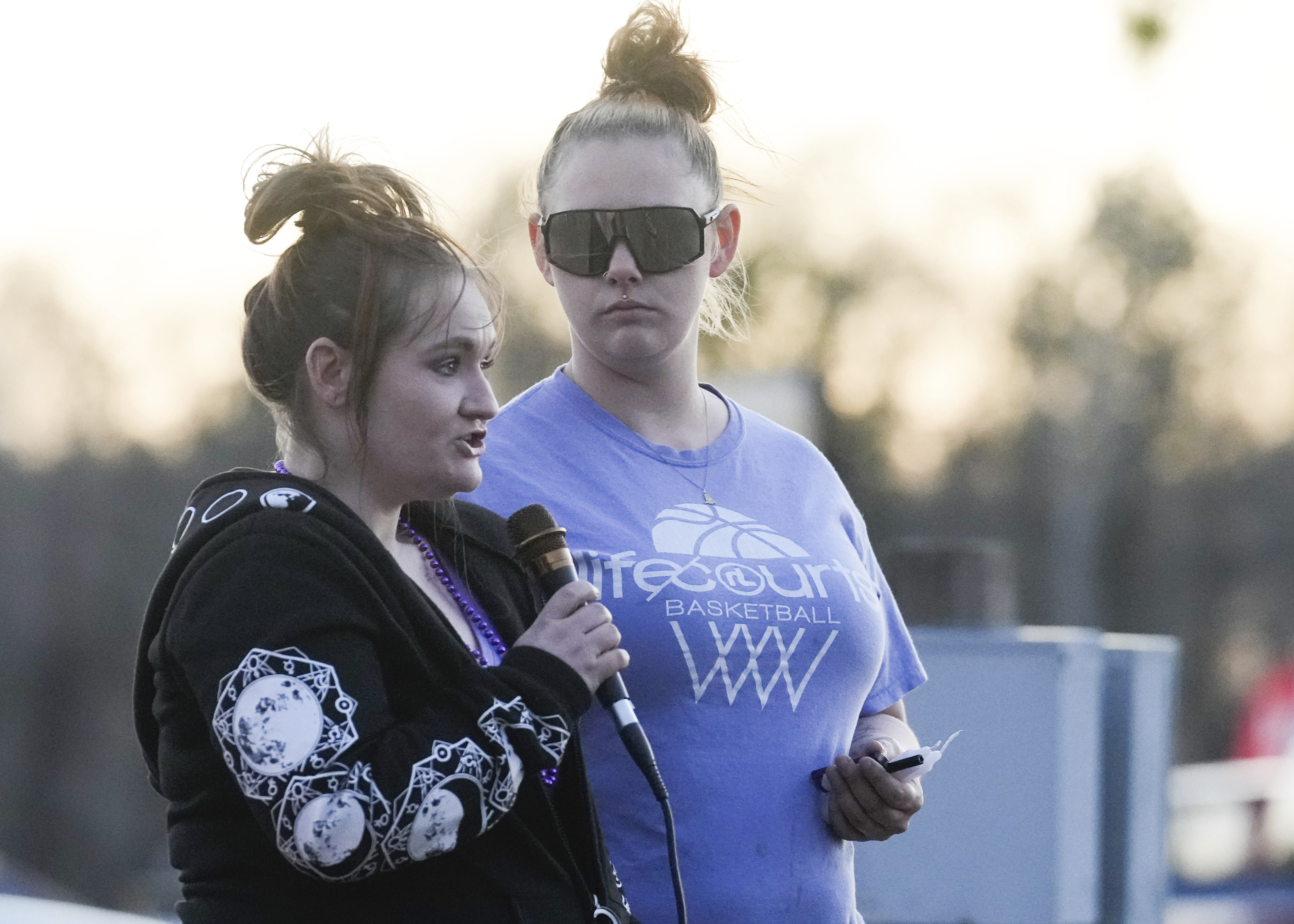 Audrii Cunningham's mom, Cassie Matthews and an unidentified woman at Audrii Cunningham's Vigil in Livingston, Texas on February 21, 2024 | Source: Getty Images