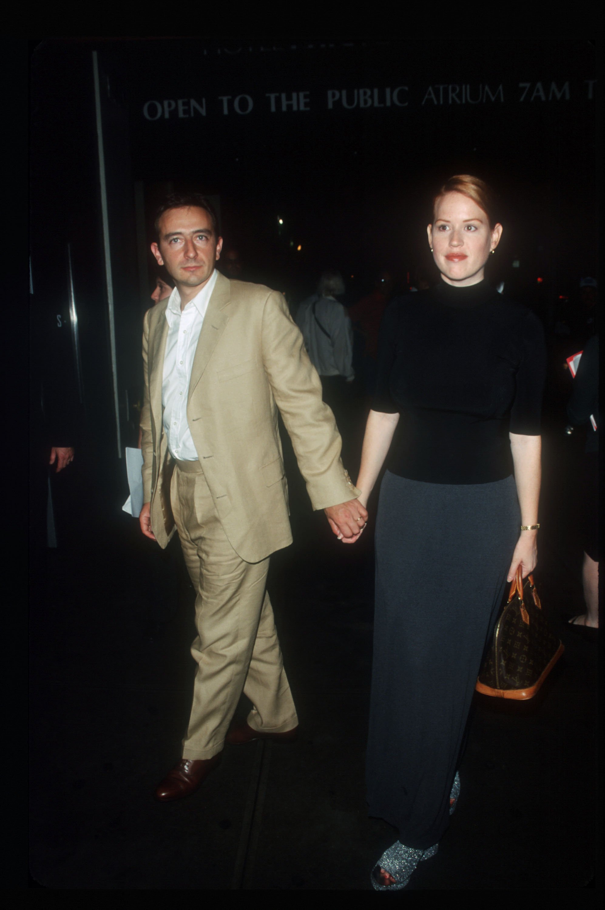 Molly Ringwald and Valery Lameignère attend the premiere of "Guinevere" September 7, 1999, in New York City. | Source: Getty Images